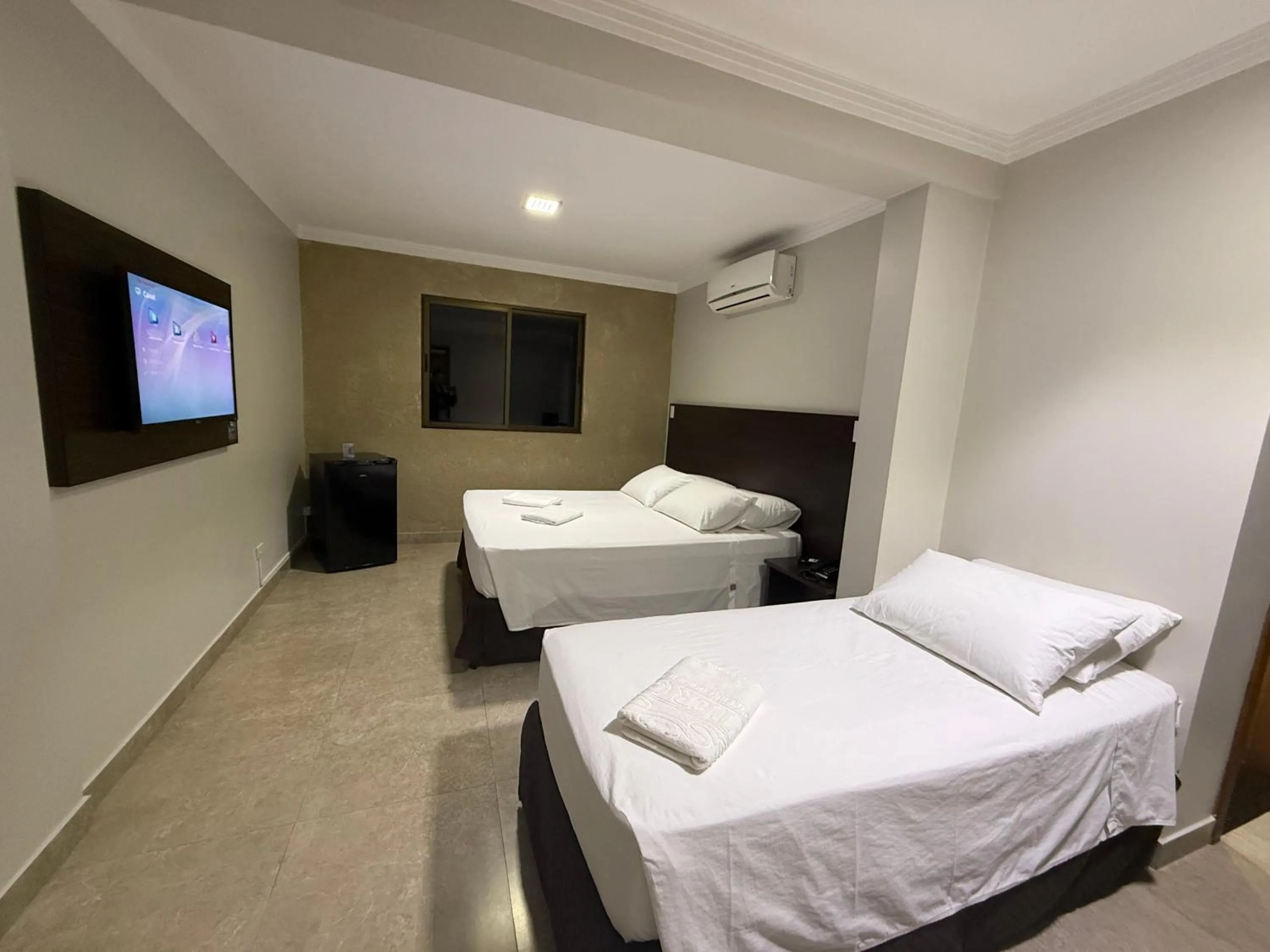 Bed in Master Gold Hotel Express