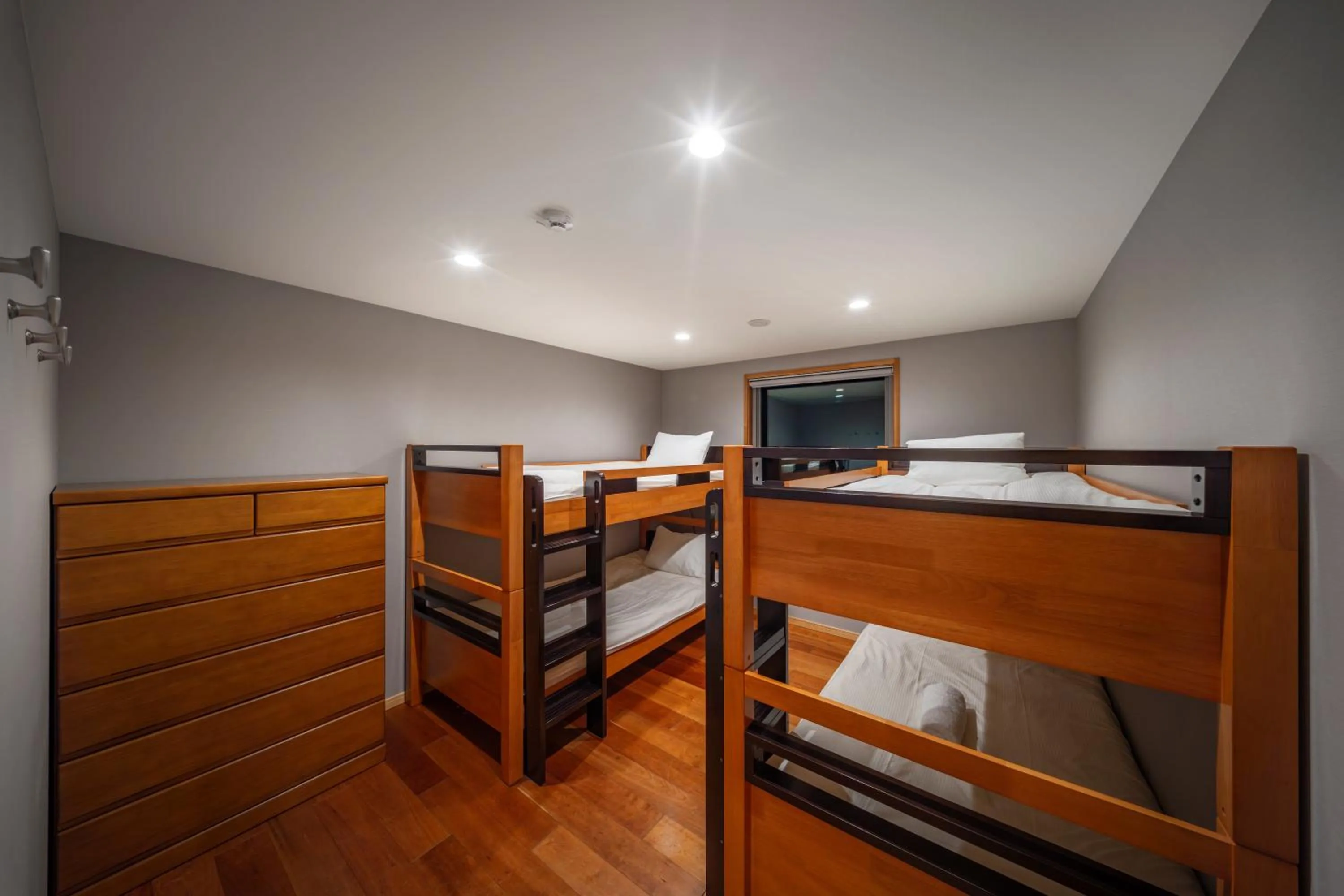 Bed in Bluebird Chalets by The Hakuba Collection