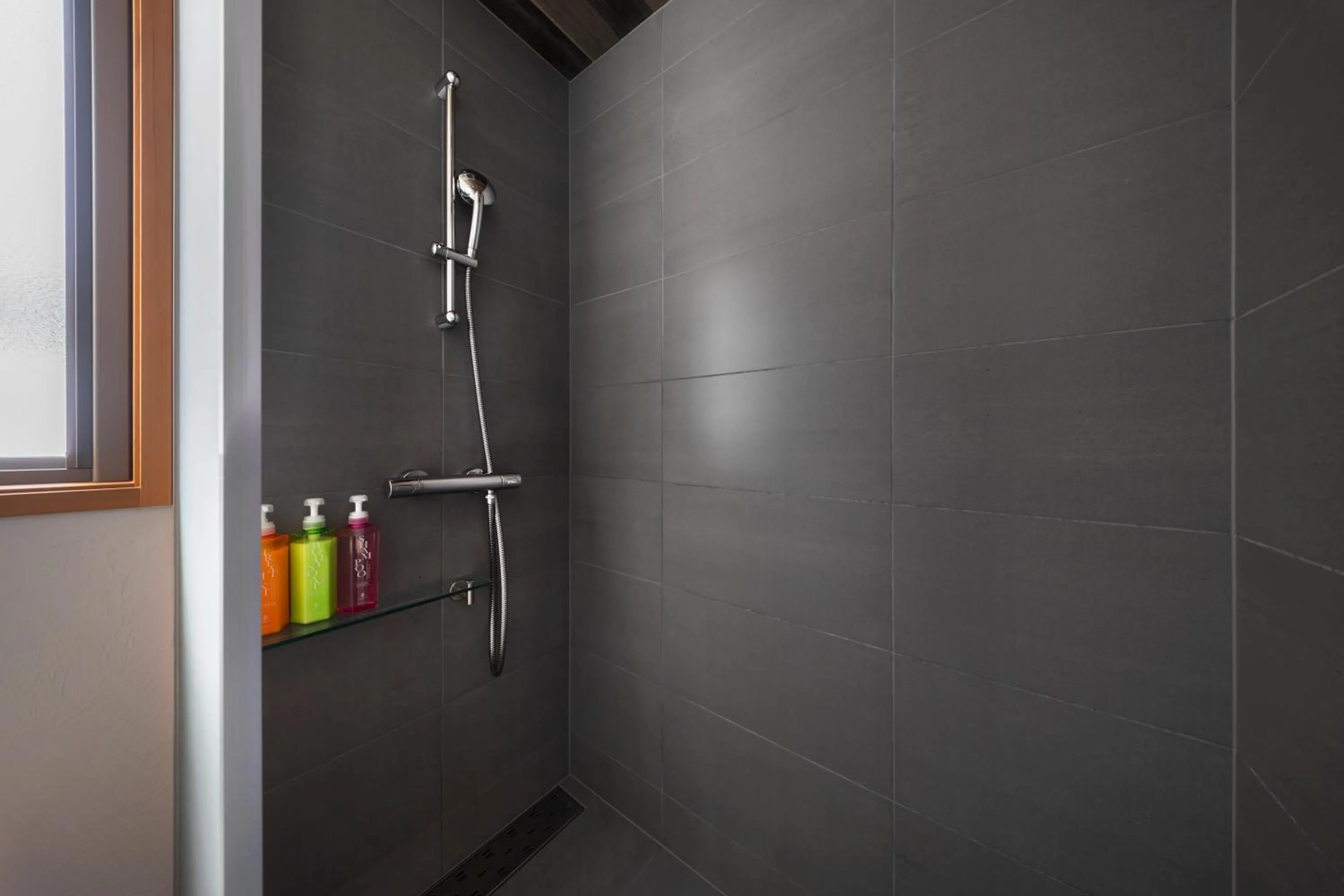 Shower in Bluebird Chalets by The Hakuba Collection