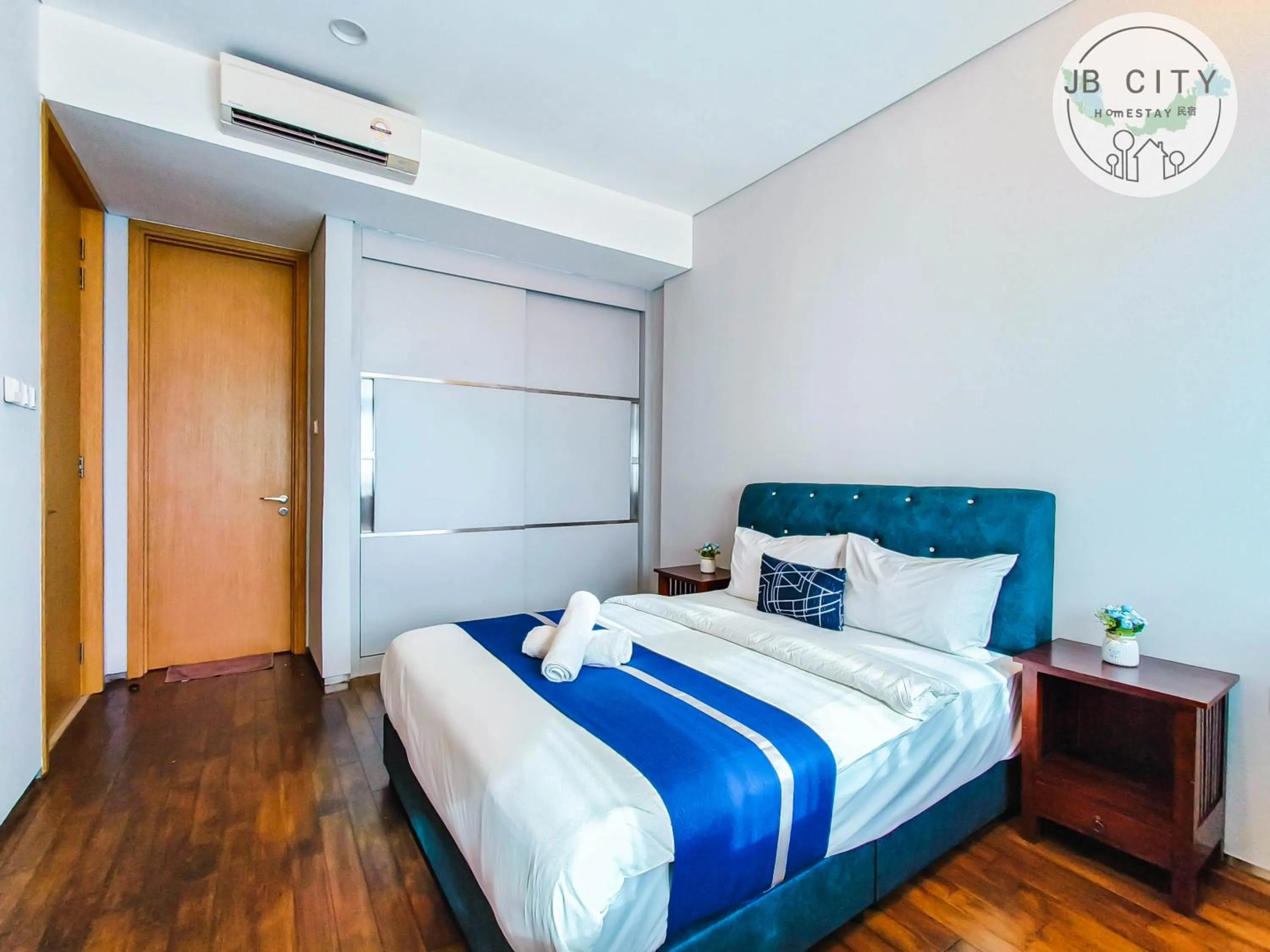 Bed in Pine Tree Suites by RR JBcity