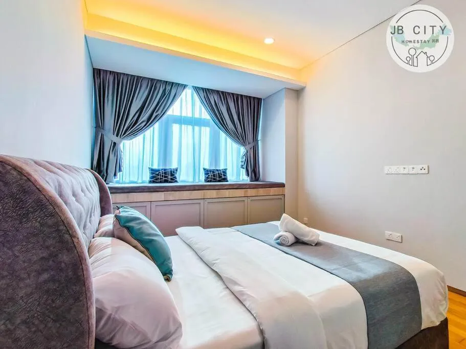 Bed in Pine Tree Suites by RR JBcity