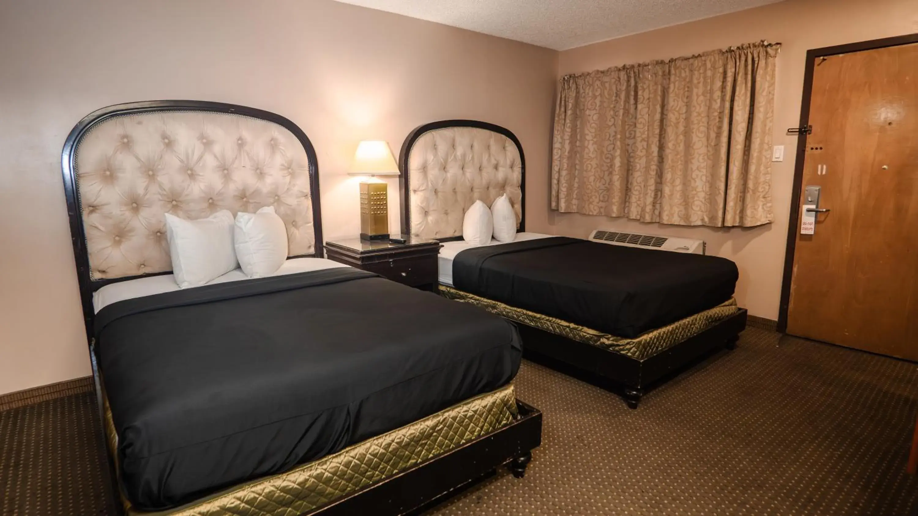 Bedroom, Bed in G T Hotels Inn & Suites Extended Stay Bedroom, Bed in G T Hotels Inn & Suites Extended Stay