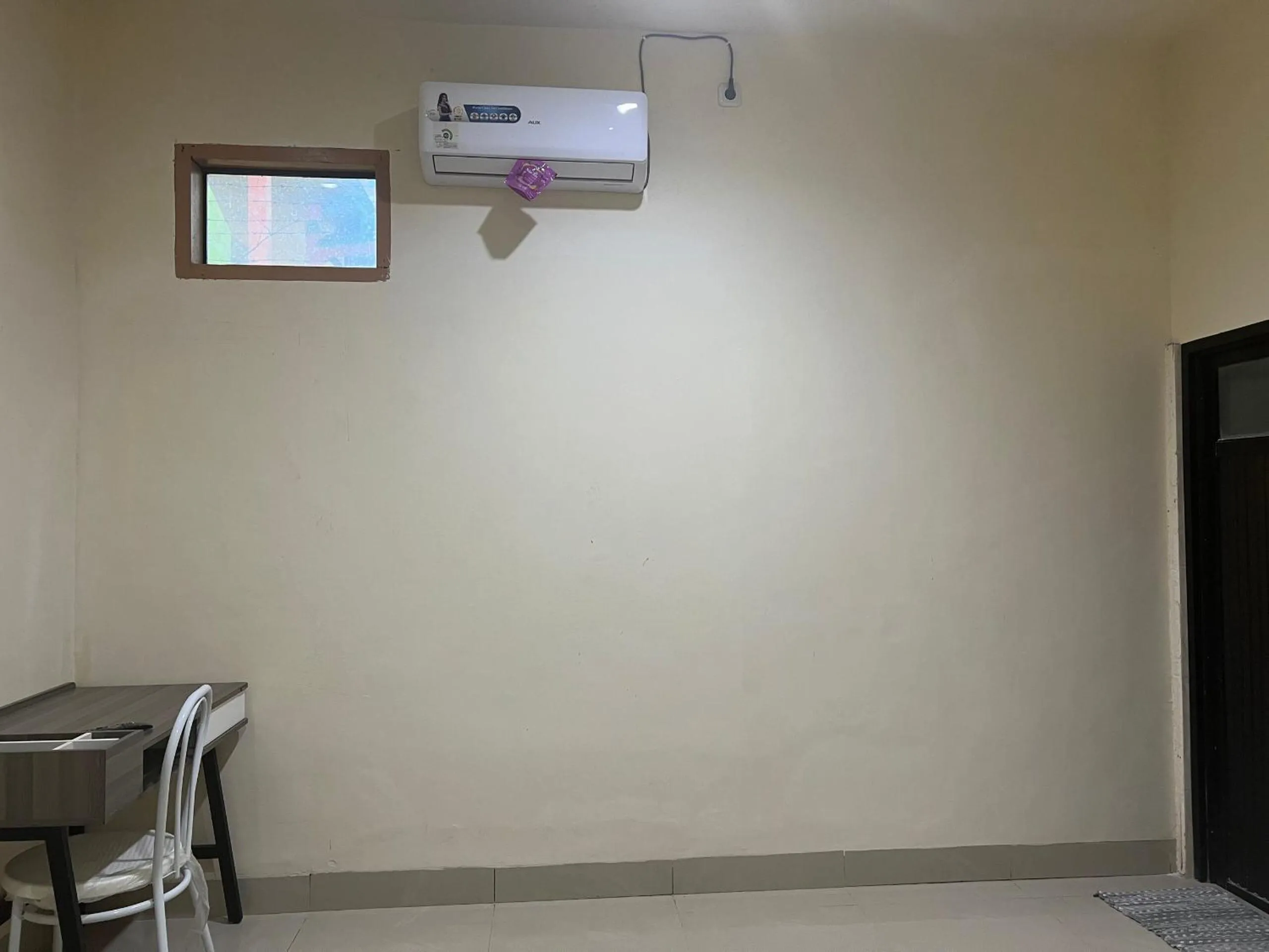 Bedroom in Hotel O Wisma Aliyah Near Sidrap