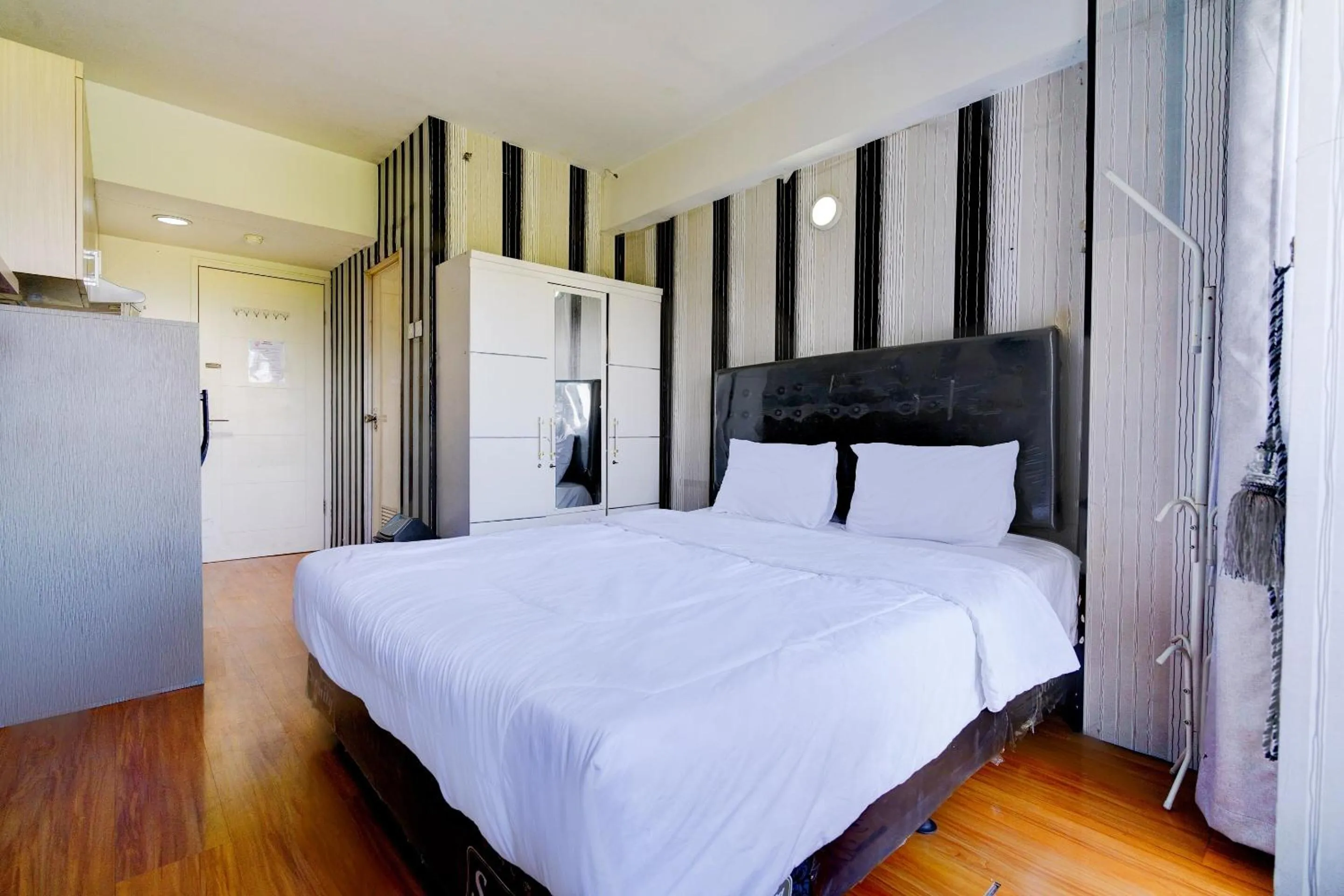 Bedroom, Bed in OYO Life 92874 Apartement Grand Sentraland Karawang By Red Dragon