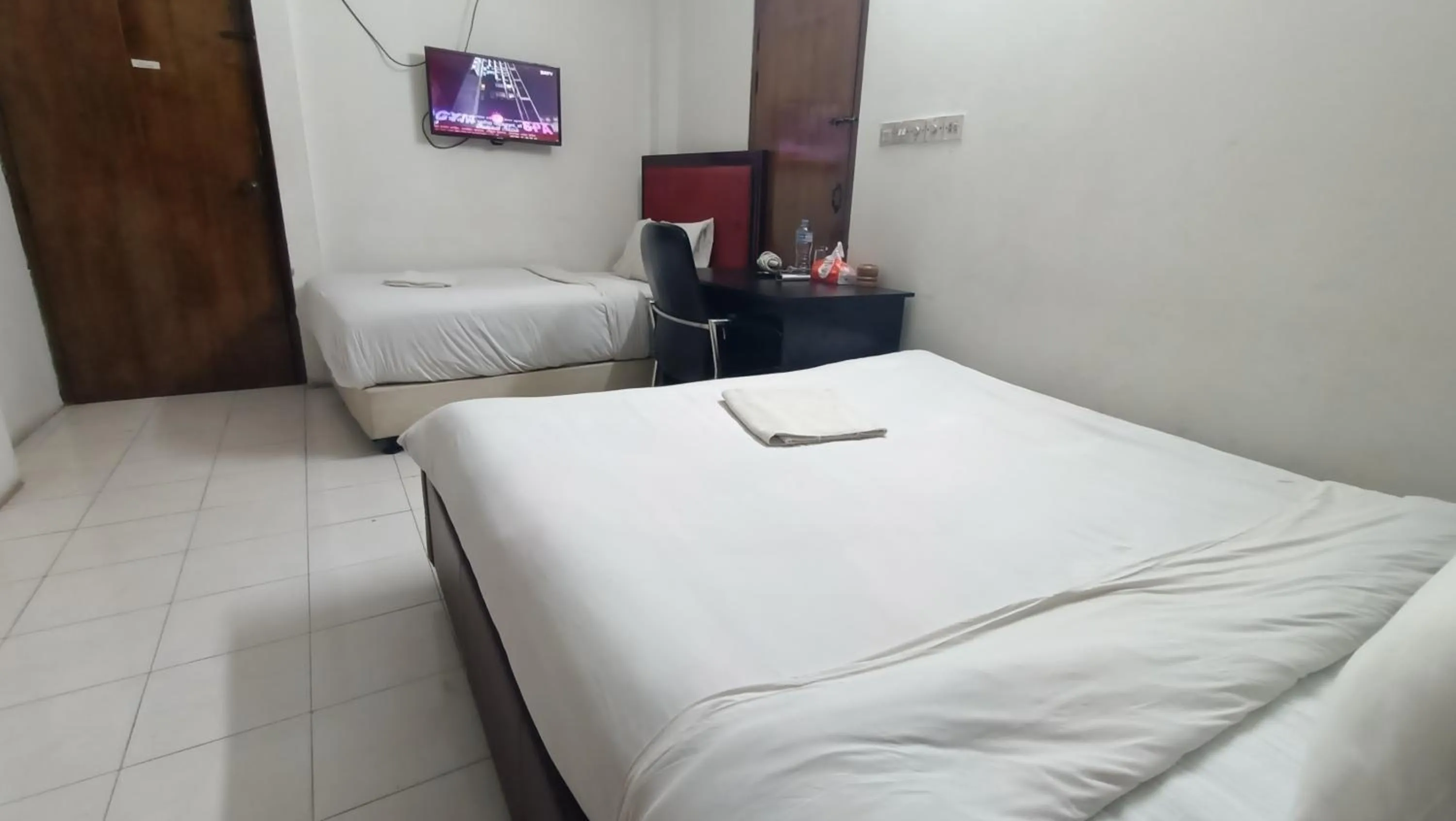 Bed in Hotel Golden Bird