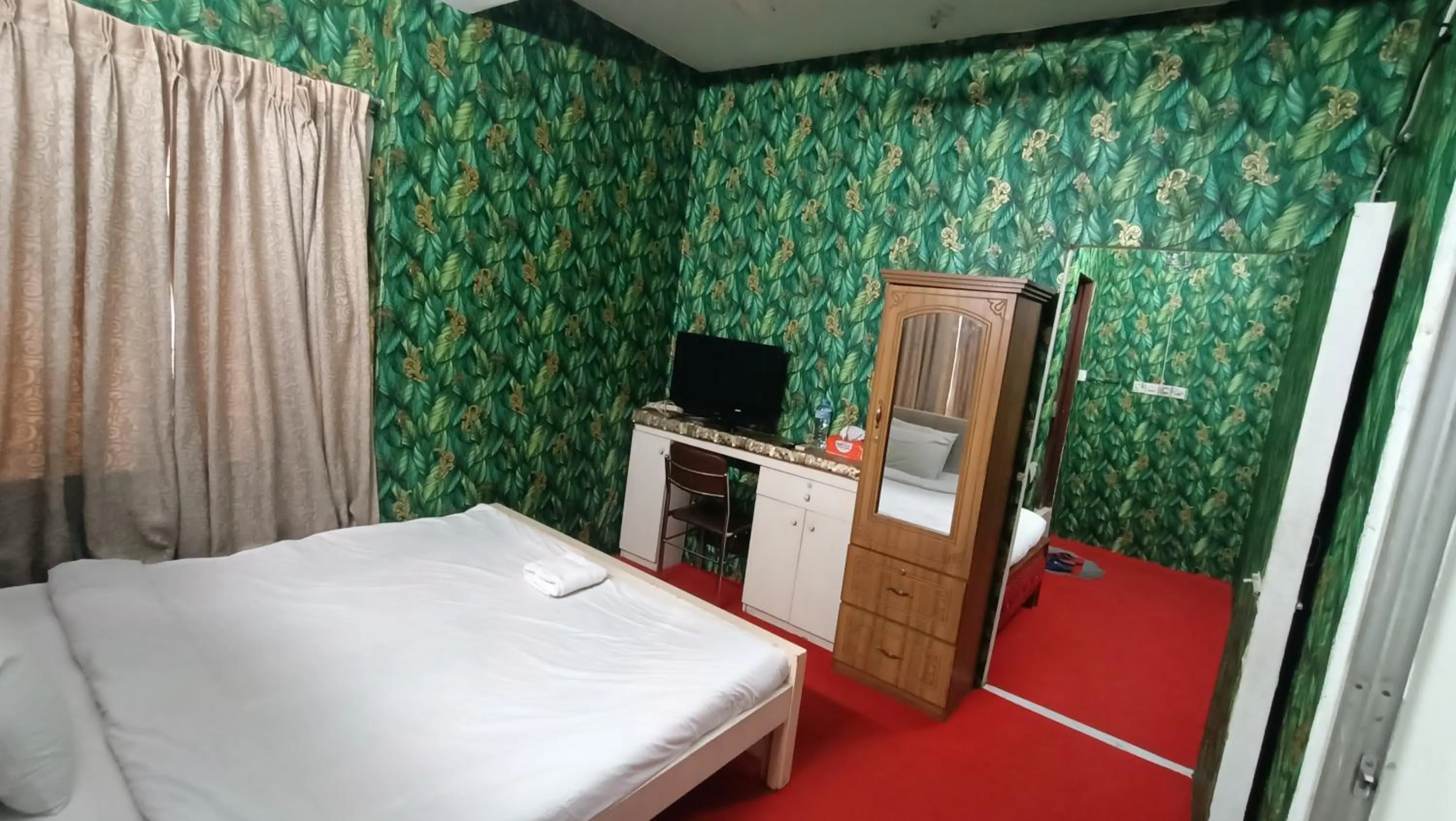 Bed in Hotel Golden Bird