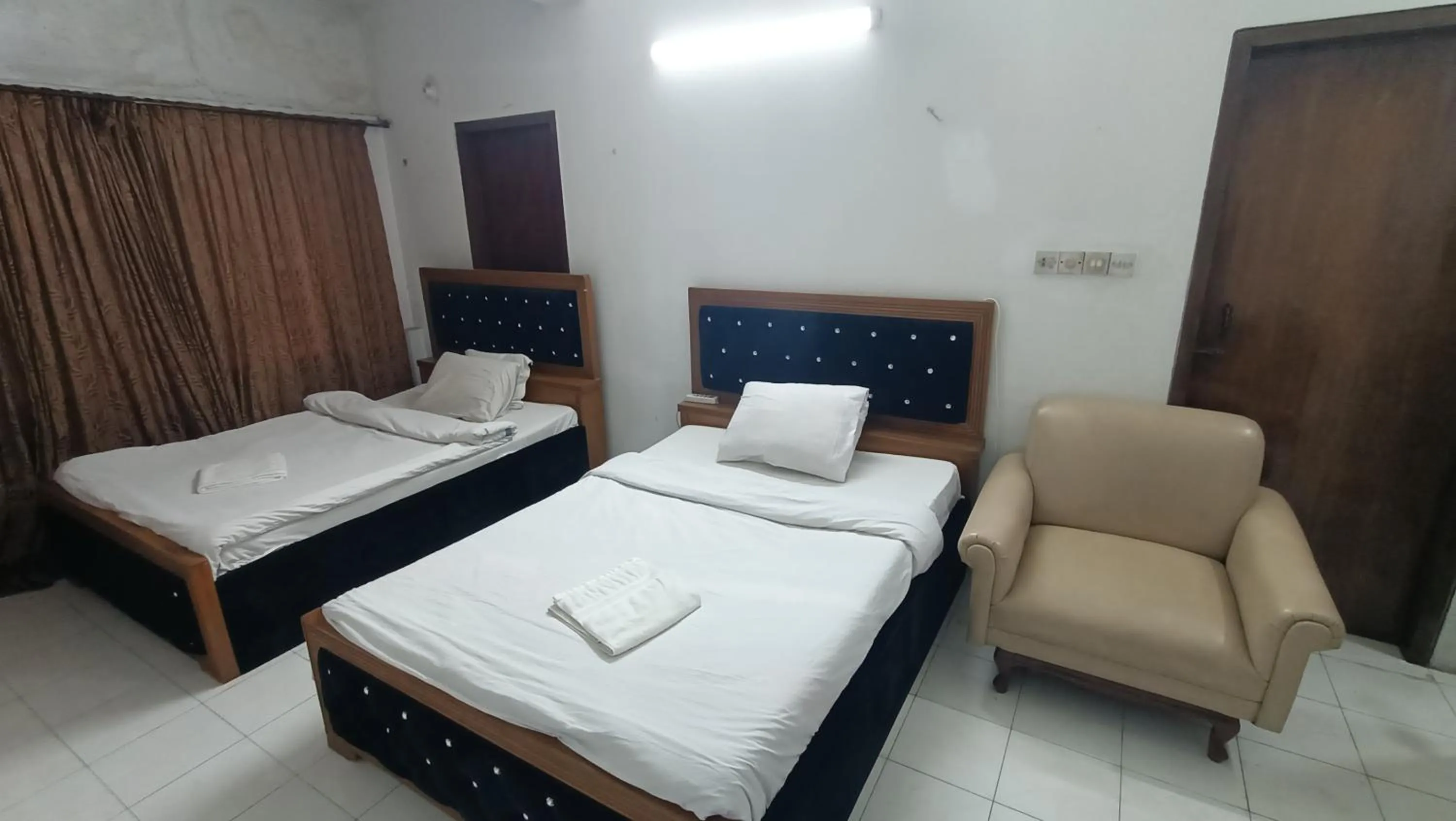 Bed in Hotel Golden Bird