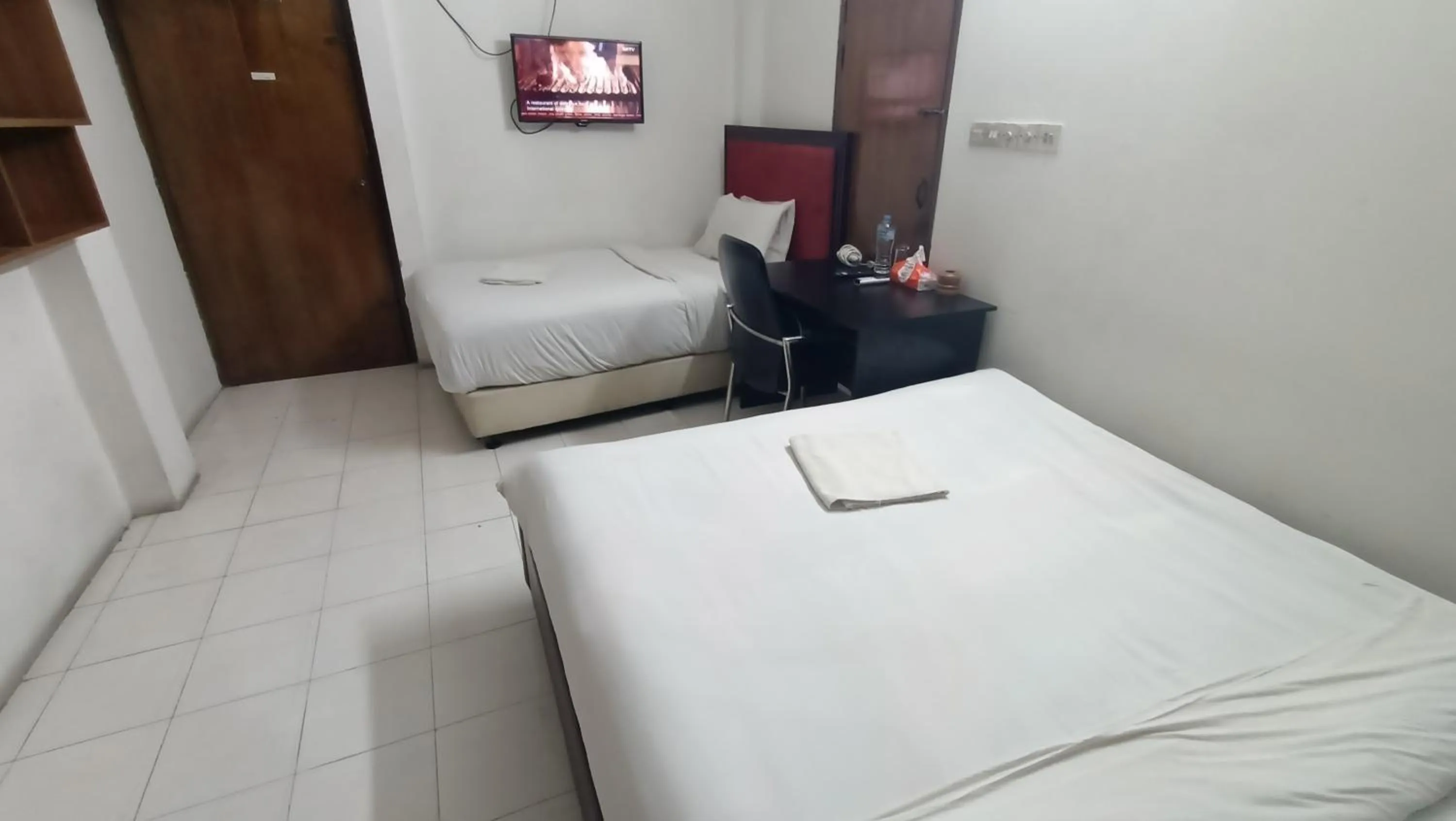 Bed in Hotel Golden Bird