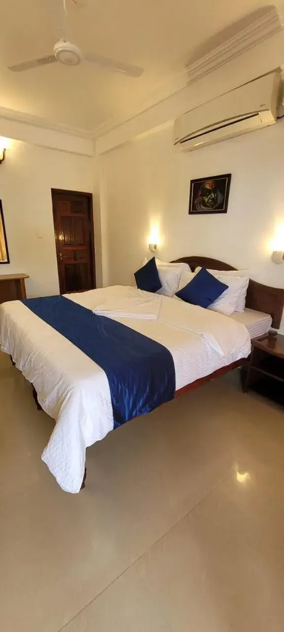 Bed in tippys beach resort Bed in tippys beach resort