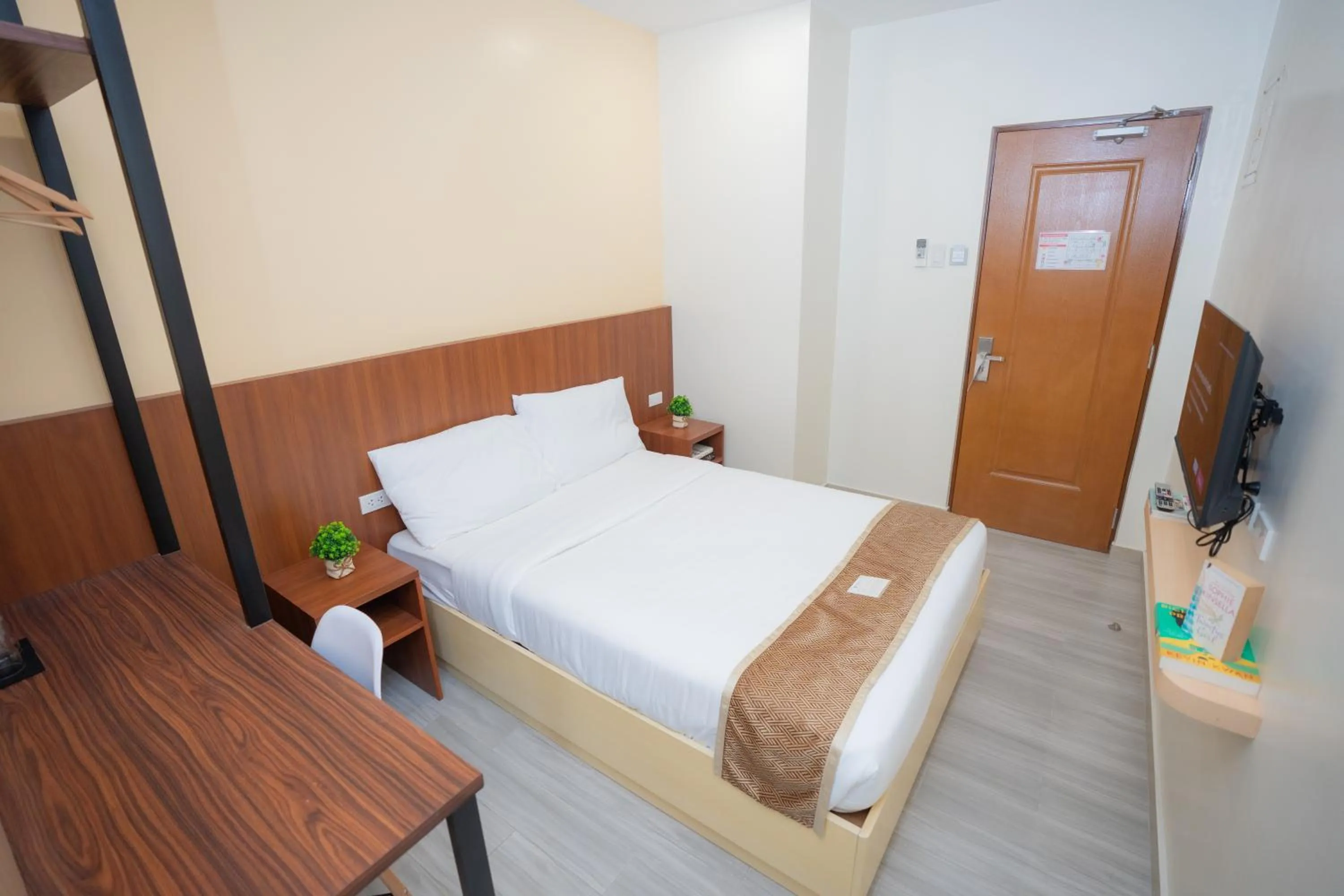 Bed in Sundaze Hotel