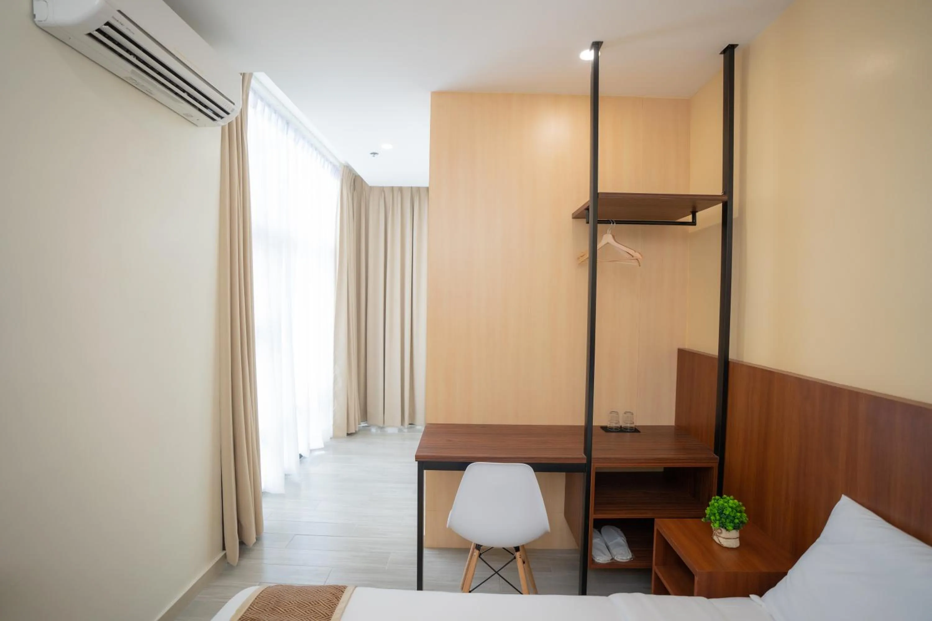 Bed in Sundaze Hotel