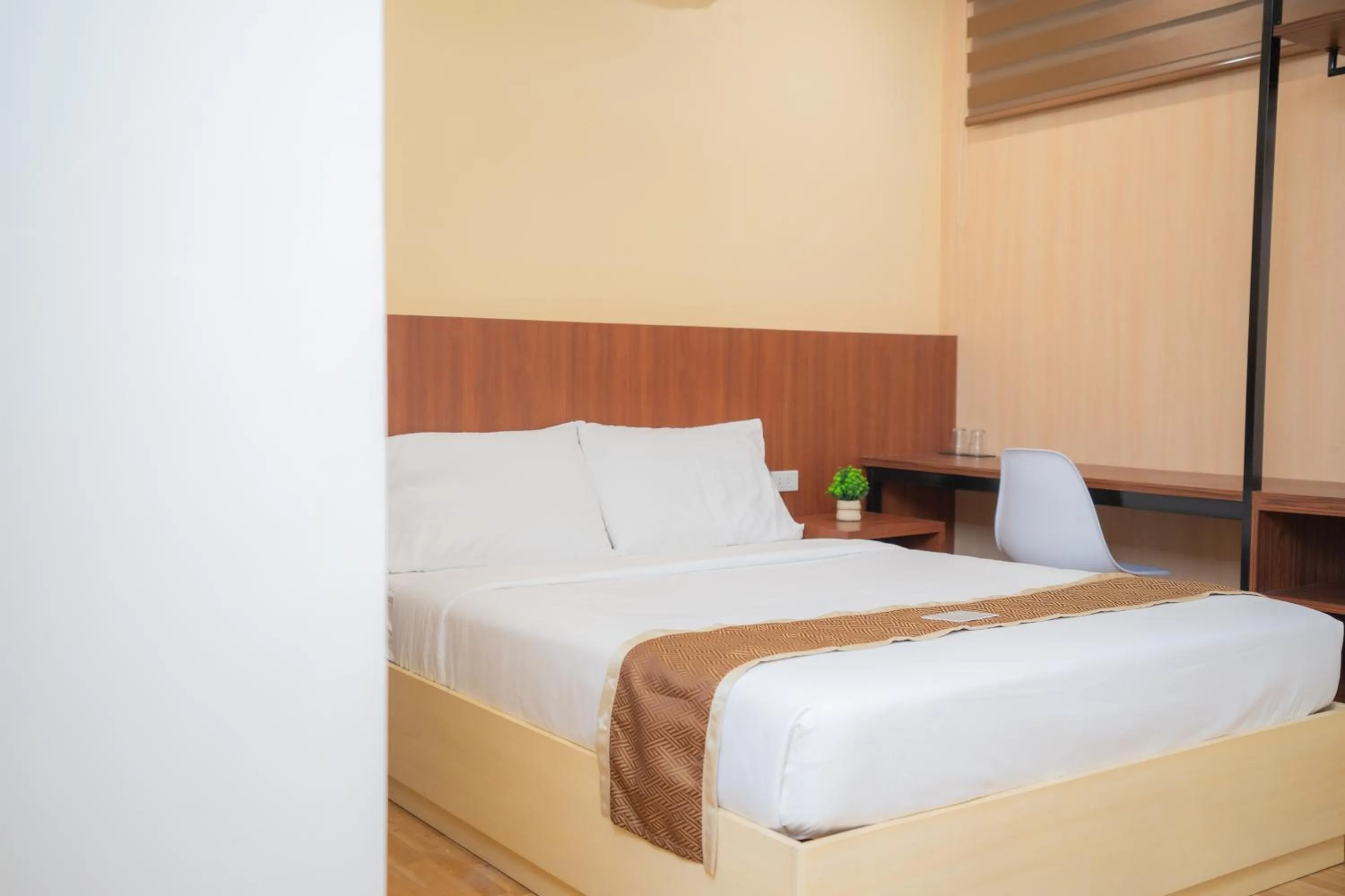 Bed in Sundaze Hotel