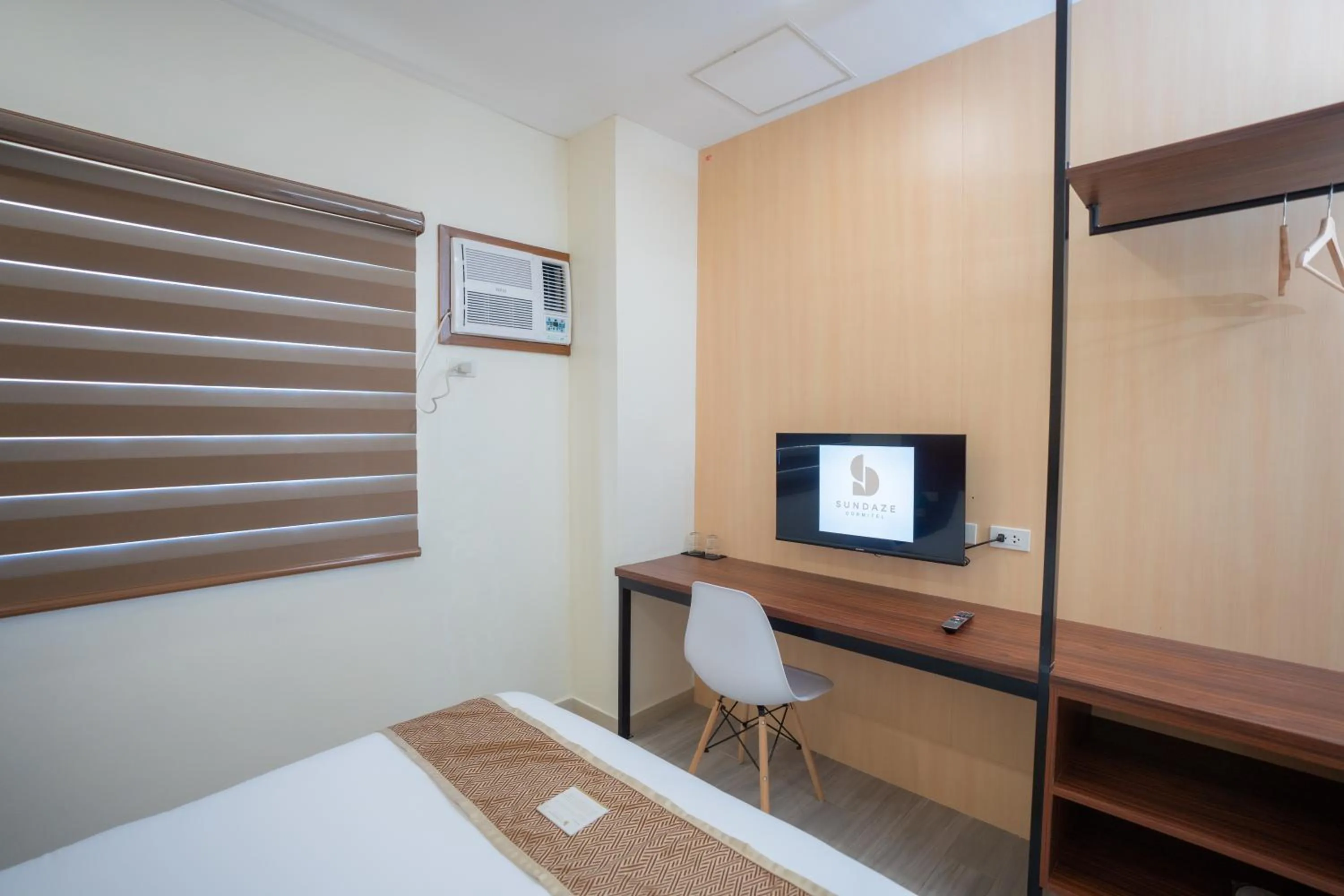 Bed in Sundaze Hotel