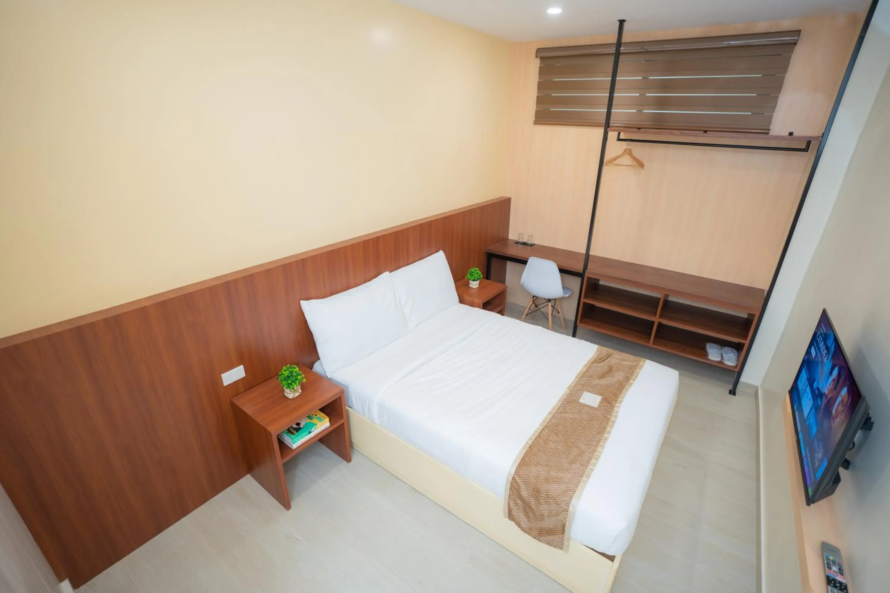 Bed in Sundaze Hotel