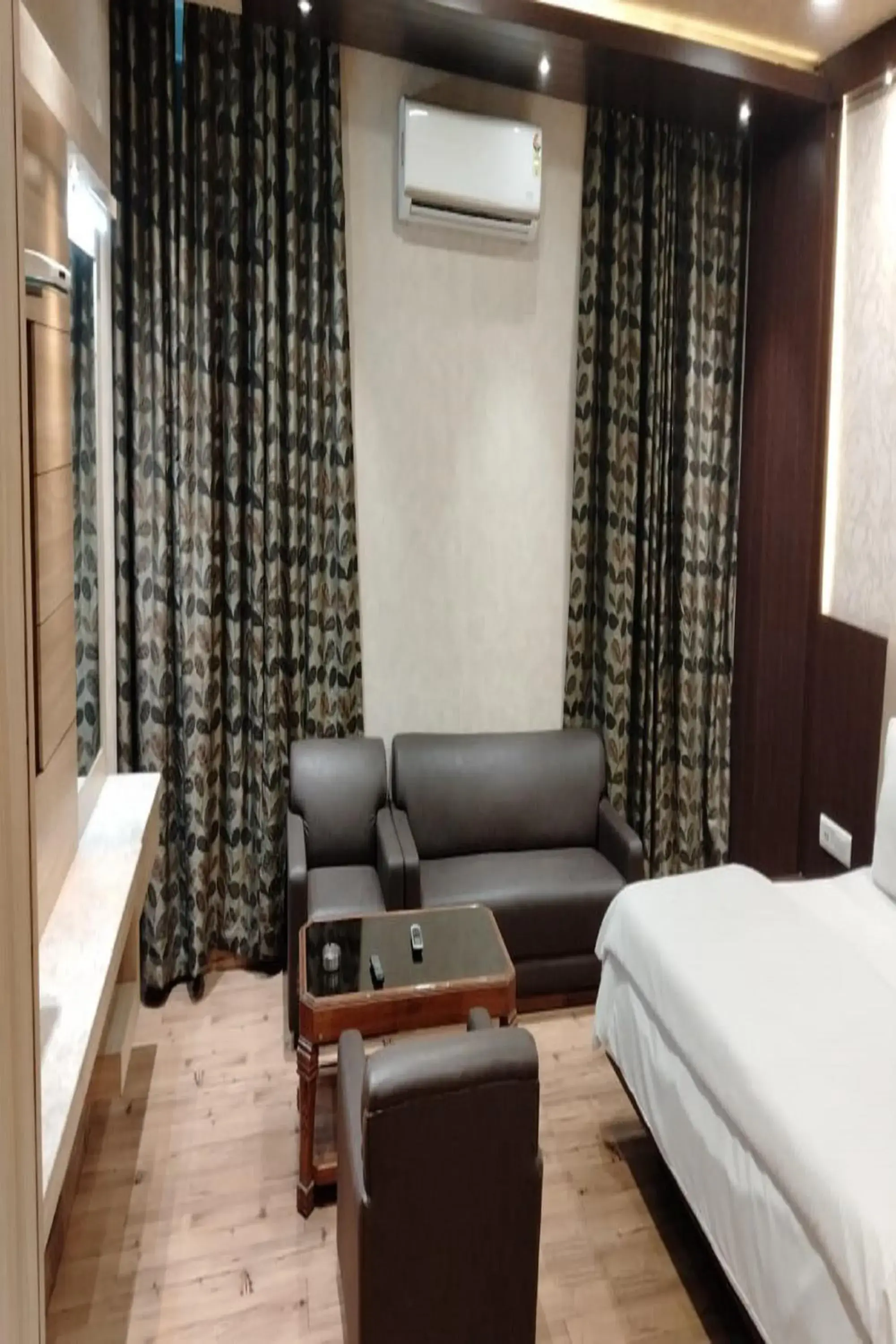 Seating area, Bed in Hotel Park Regency Seating area, Bed in Hotel Park Regency