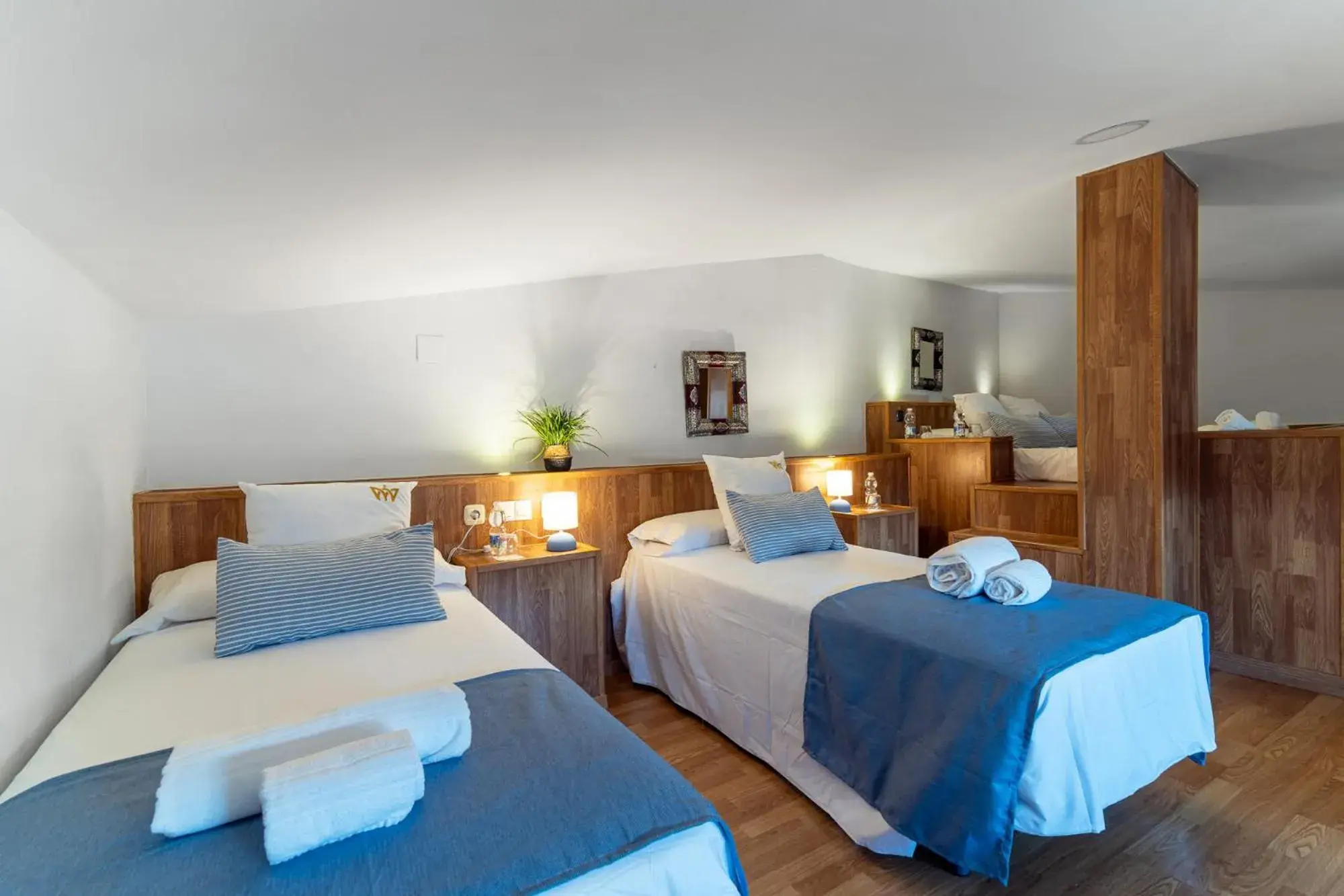 Standard Quadruple Room in Hotel Reina Mora Standard Quadruple Room in Hotel Reina Mora