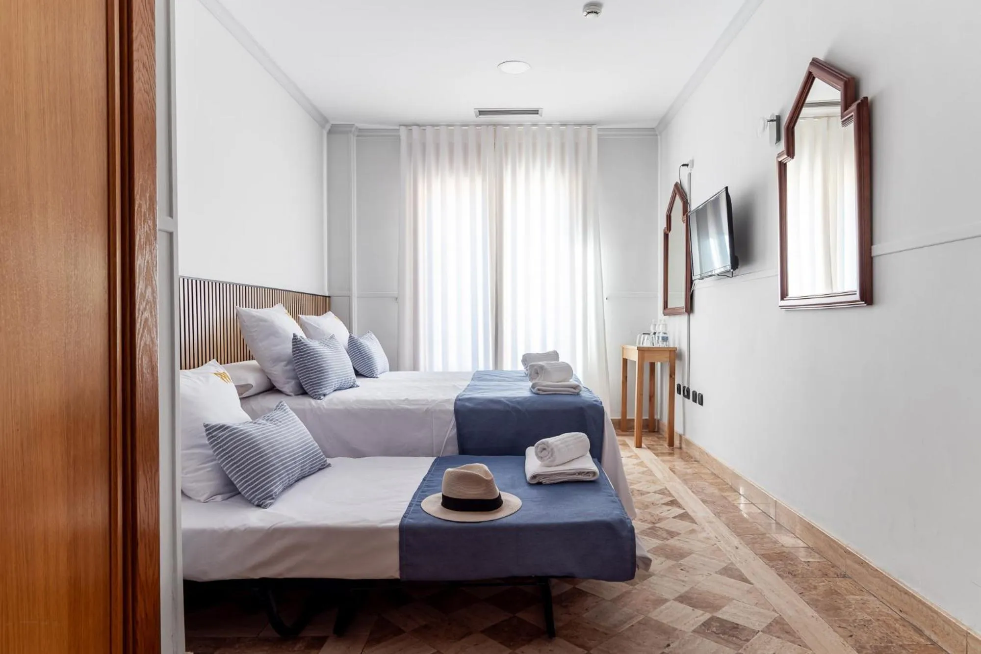 Bed in Hotel Reina Mora