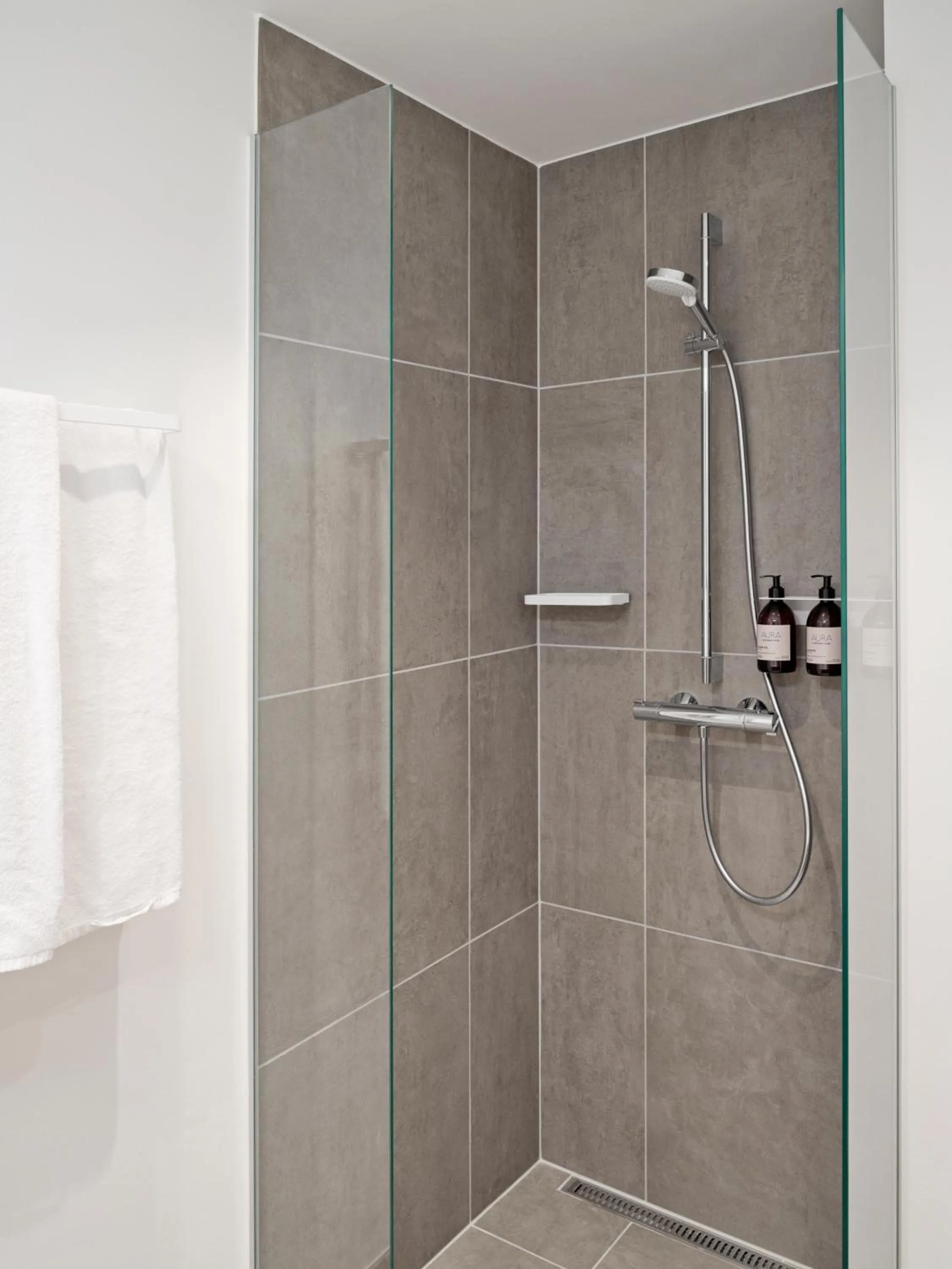 Bathroom in Aura Apartment Hotel