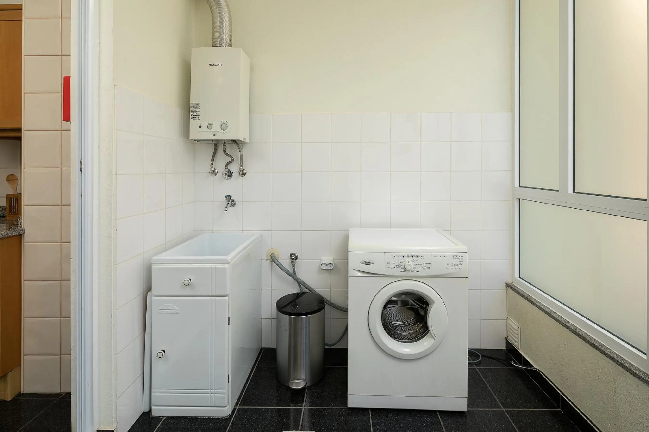 washing machine in Apartamento Vale e Mar