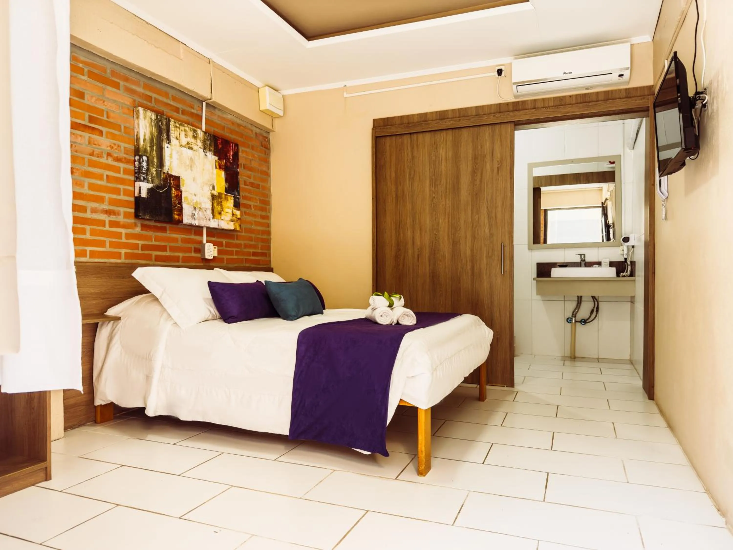 Bedroom in Luzzy Hotel