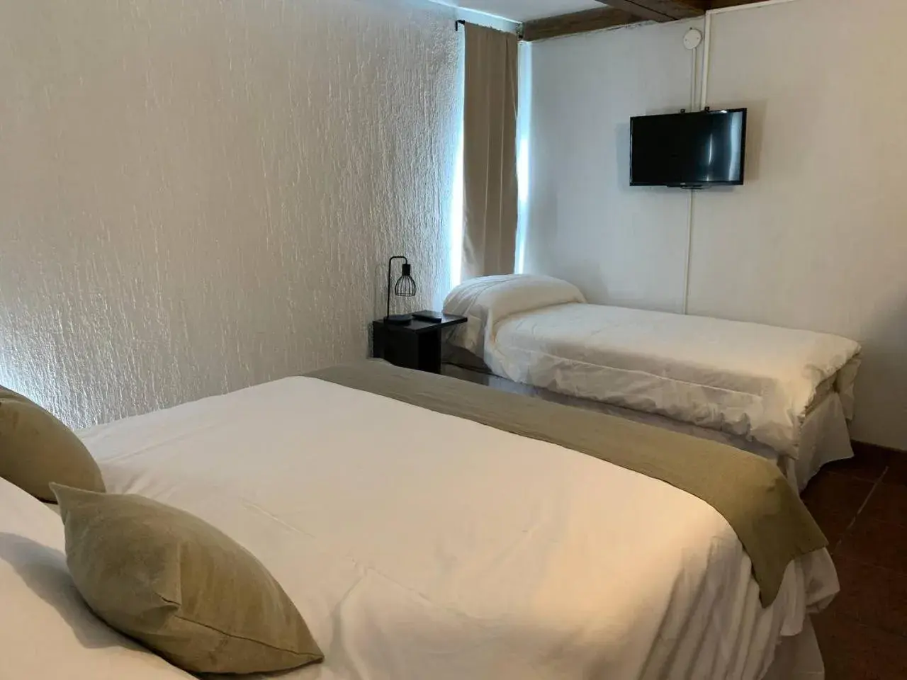 Bed in Del Caballero Hotel Bed in Del Caballero Hotel