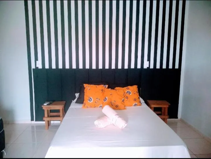 Bed in Pousada Luzemar quarto