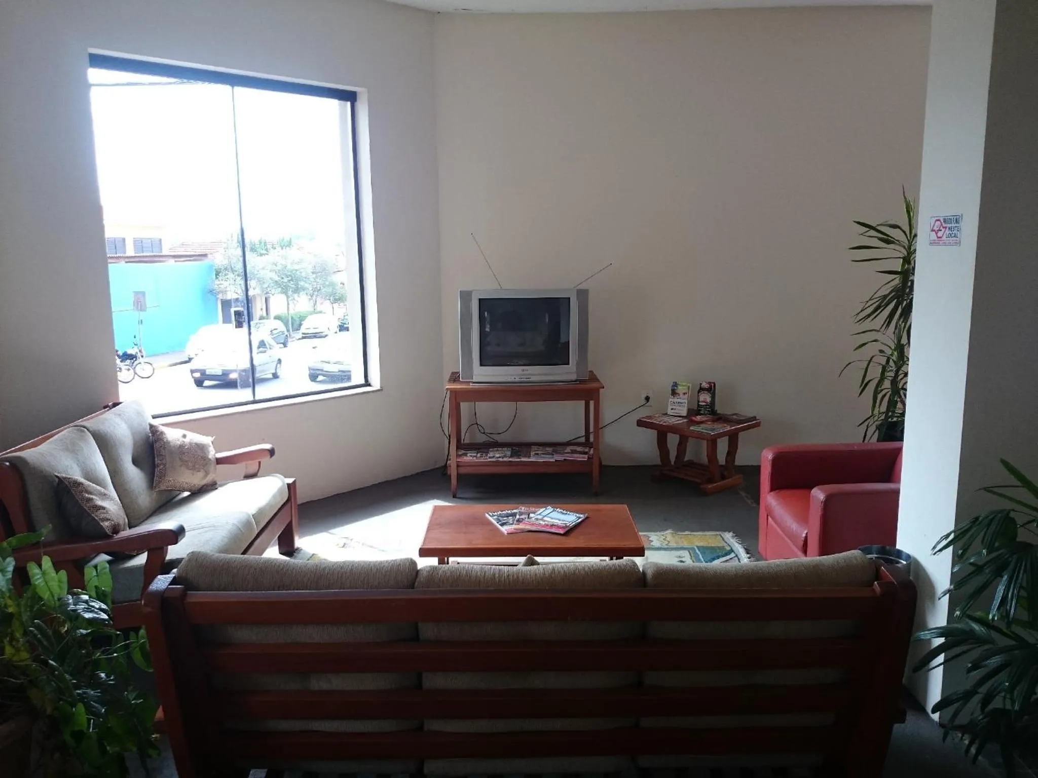 Communal lounge/ TV room in Scala Hotel Barretos