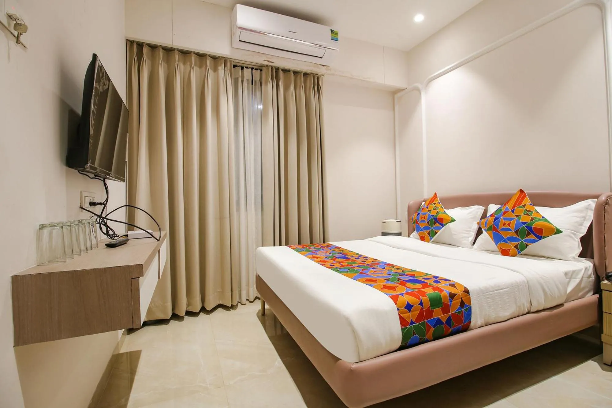 Communal lounge/ TV room, Bed in FabHotel Sharma & Vishnu Garden