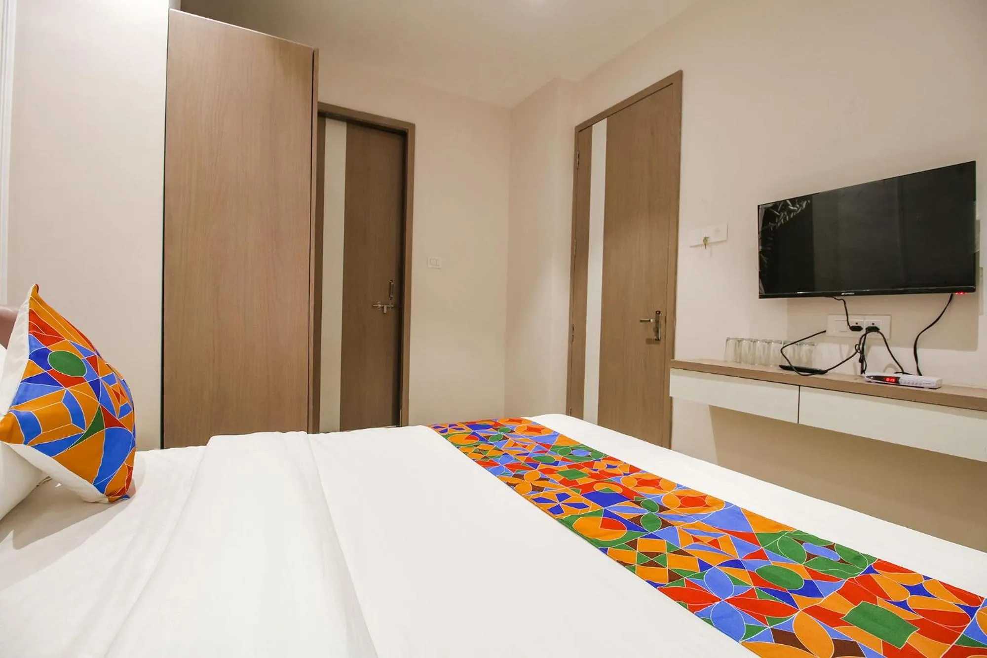 Communal lounge/ TV room, Bed in FabHotel Sharma & Vishnu Garden