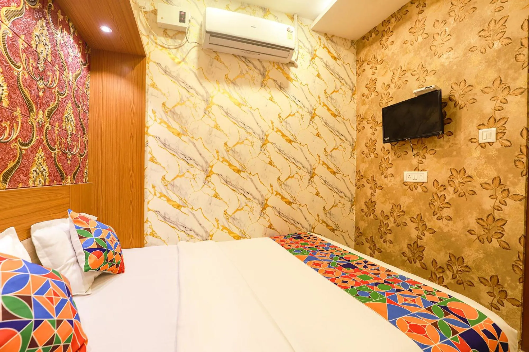 Bed in FabHotel Joy Residency