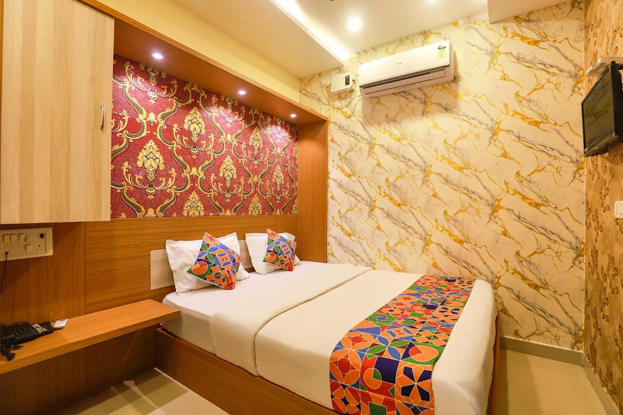 Bed in FabHotel Joy Residency