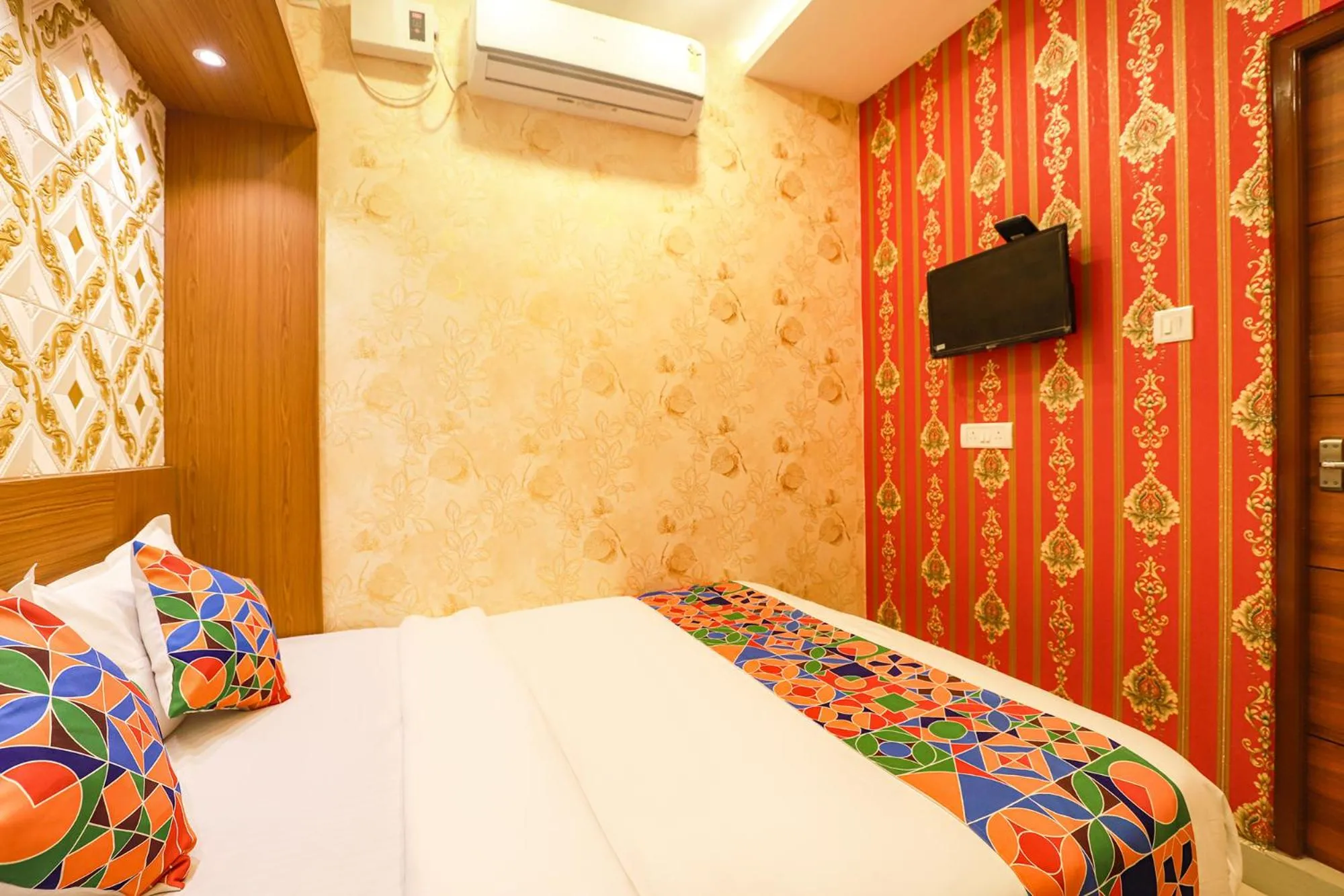 Bed in FabHotel Joy Residency