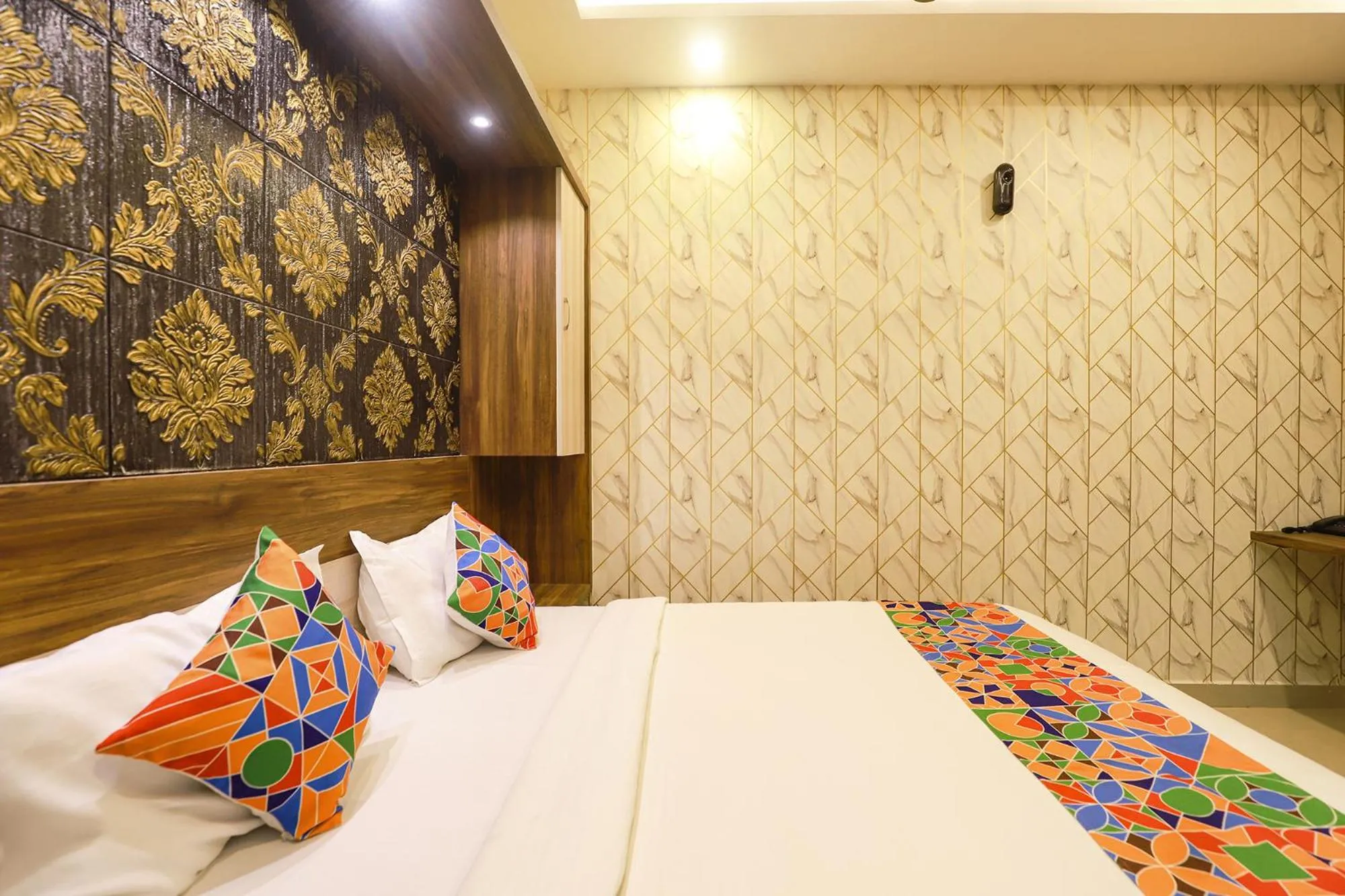 Bed in FabHotel Joy Residency