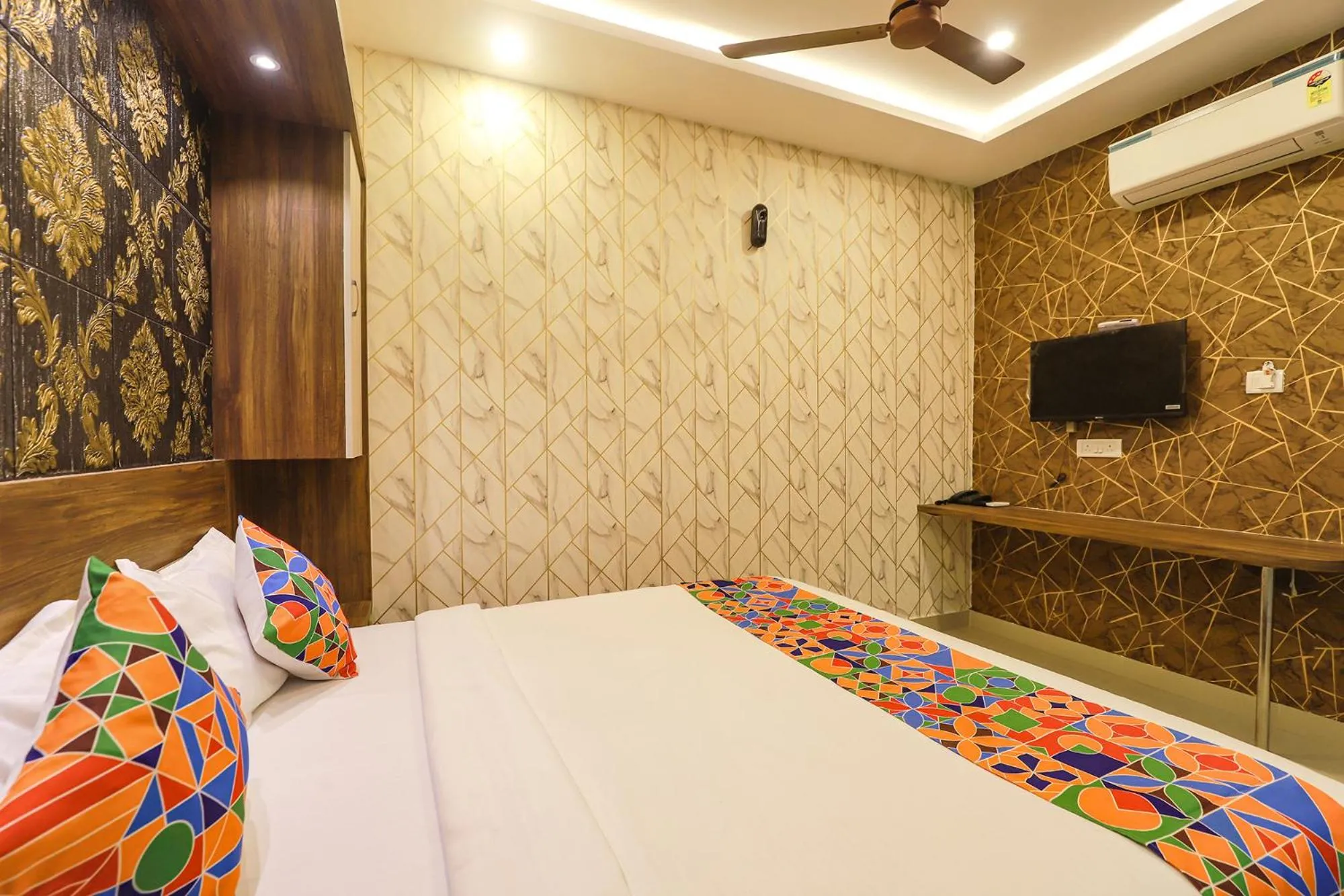 Bed in FabHotel Joy Residency