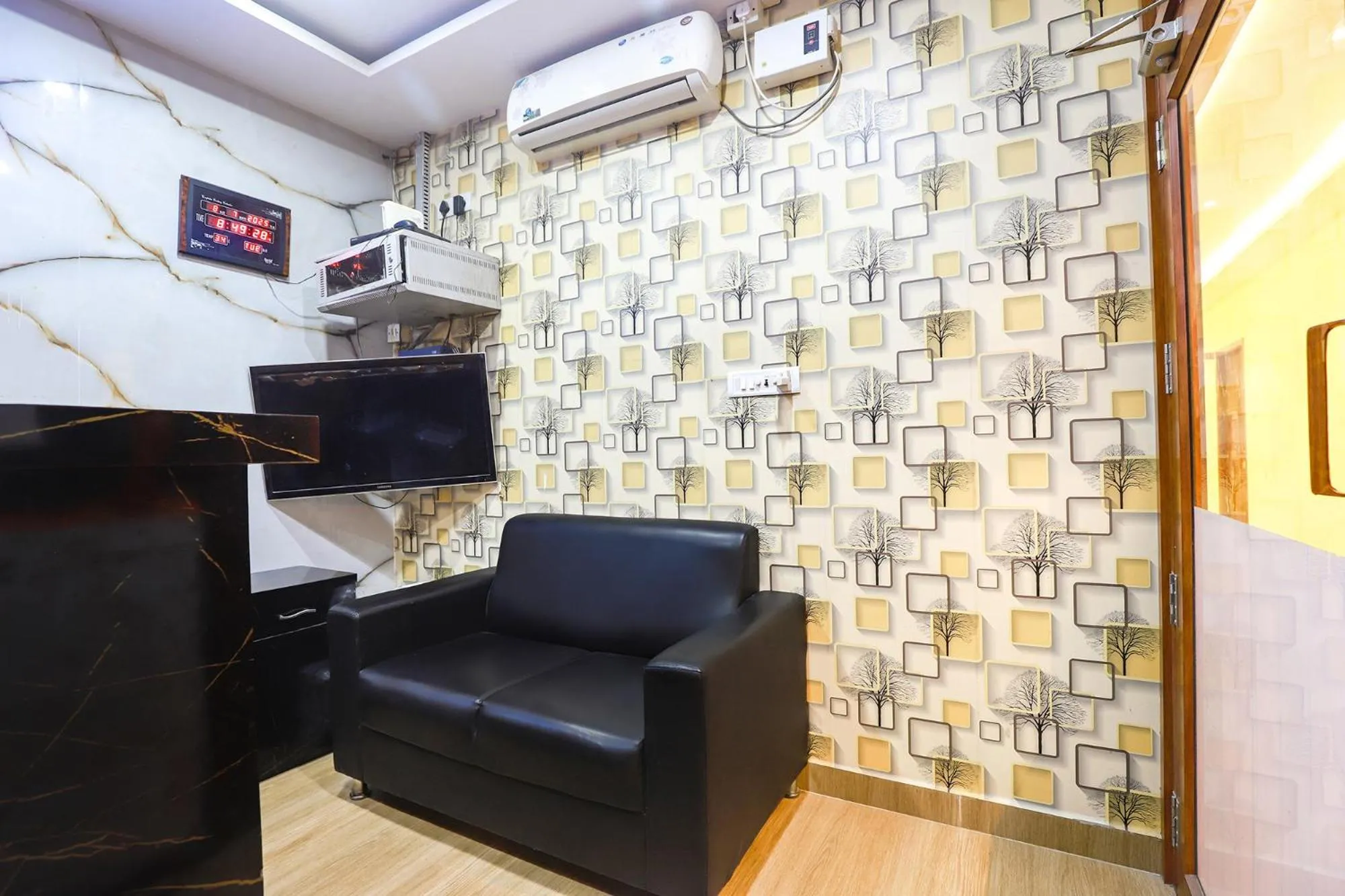 Seating area in FabHotel Joy Residency