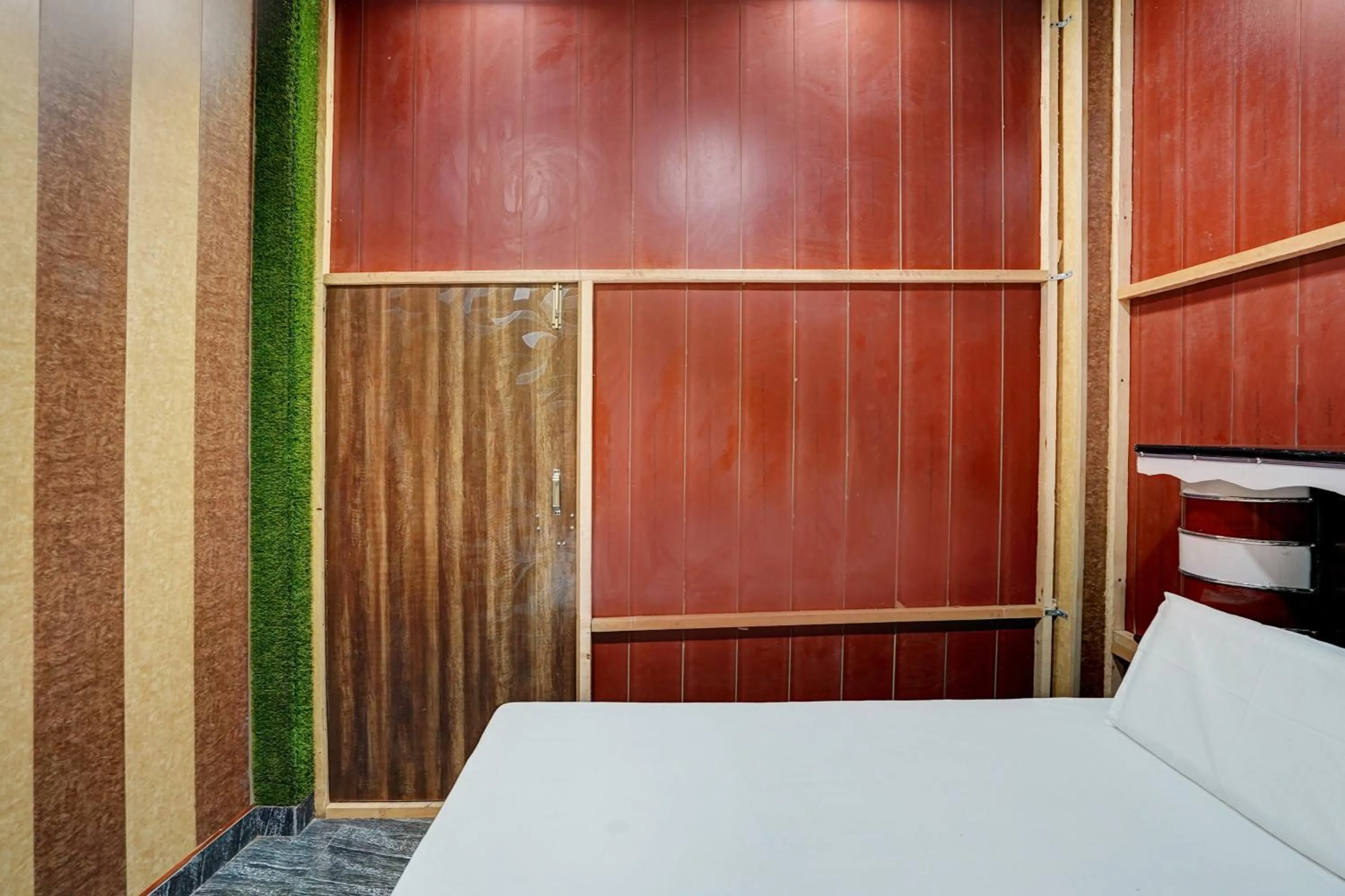 Bedroom in Hotel O The Honirav Hotel