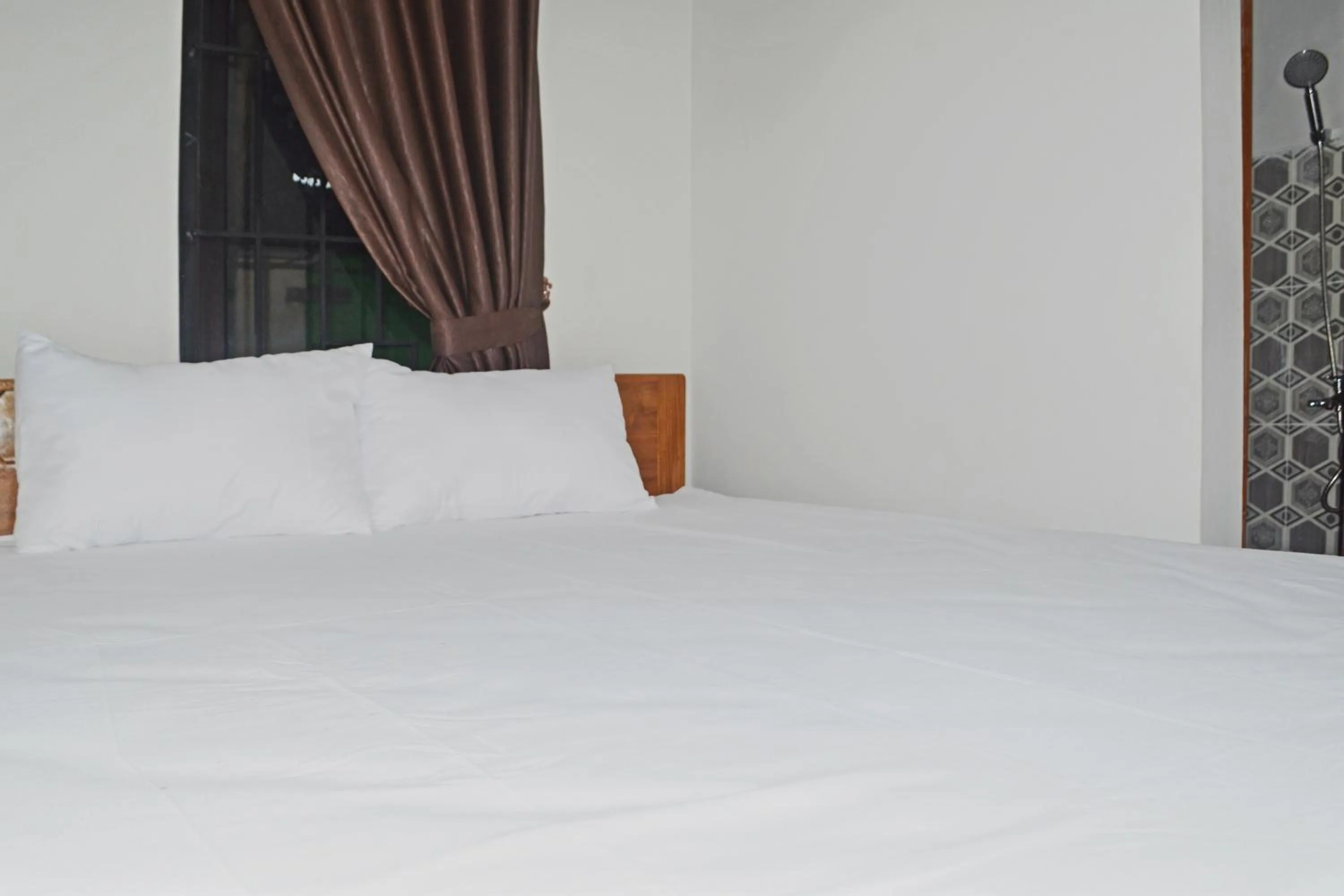 Bedroom in Super OYO 93085 Homy Stay Syariah