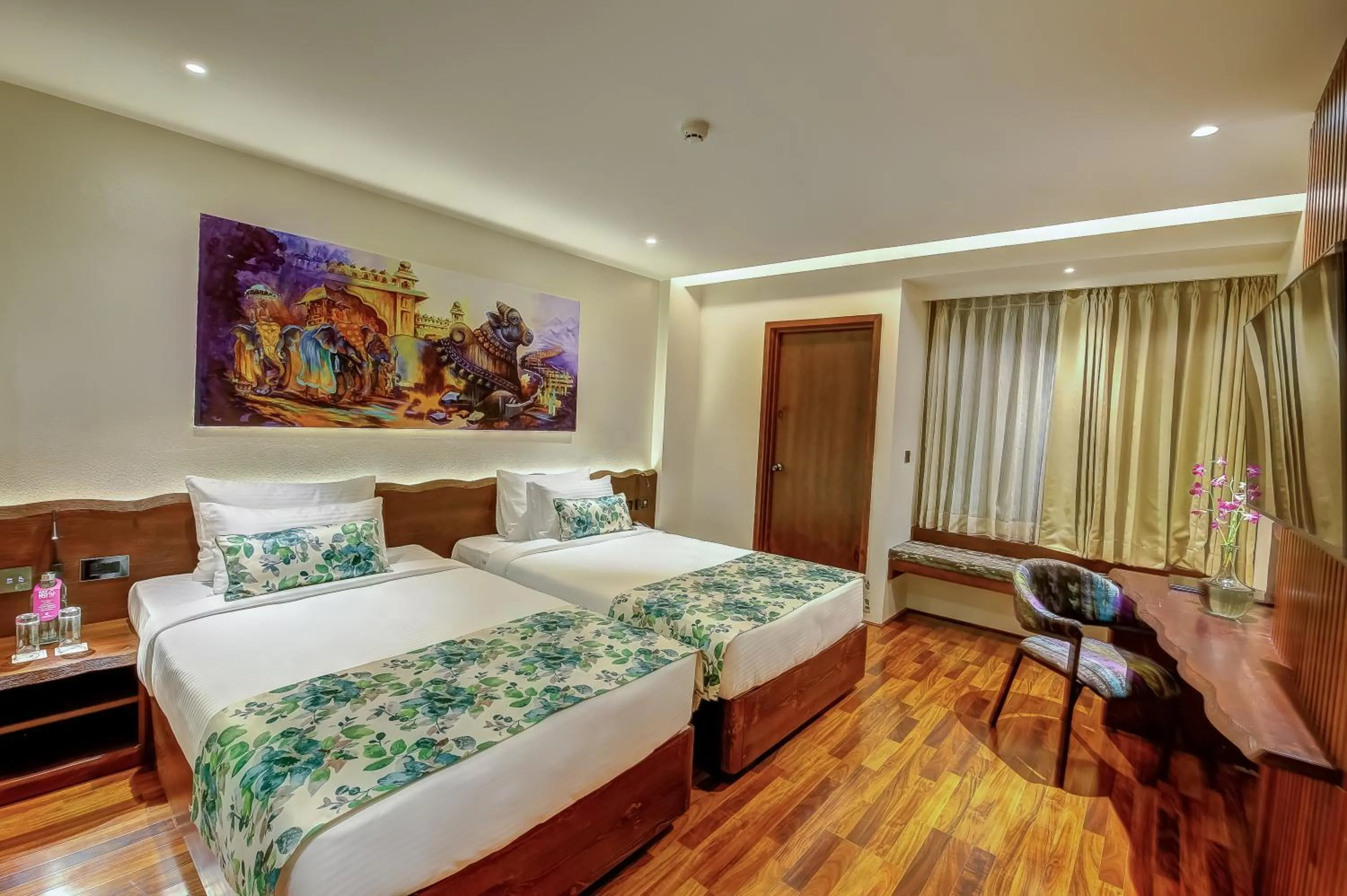 Photo of the whole room, Bed in Regenta Central Javaji Mysore