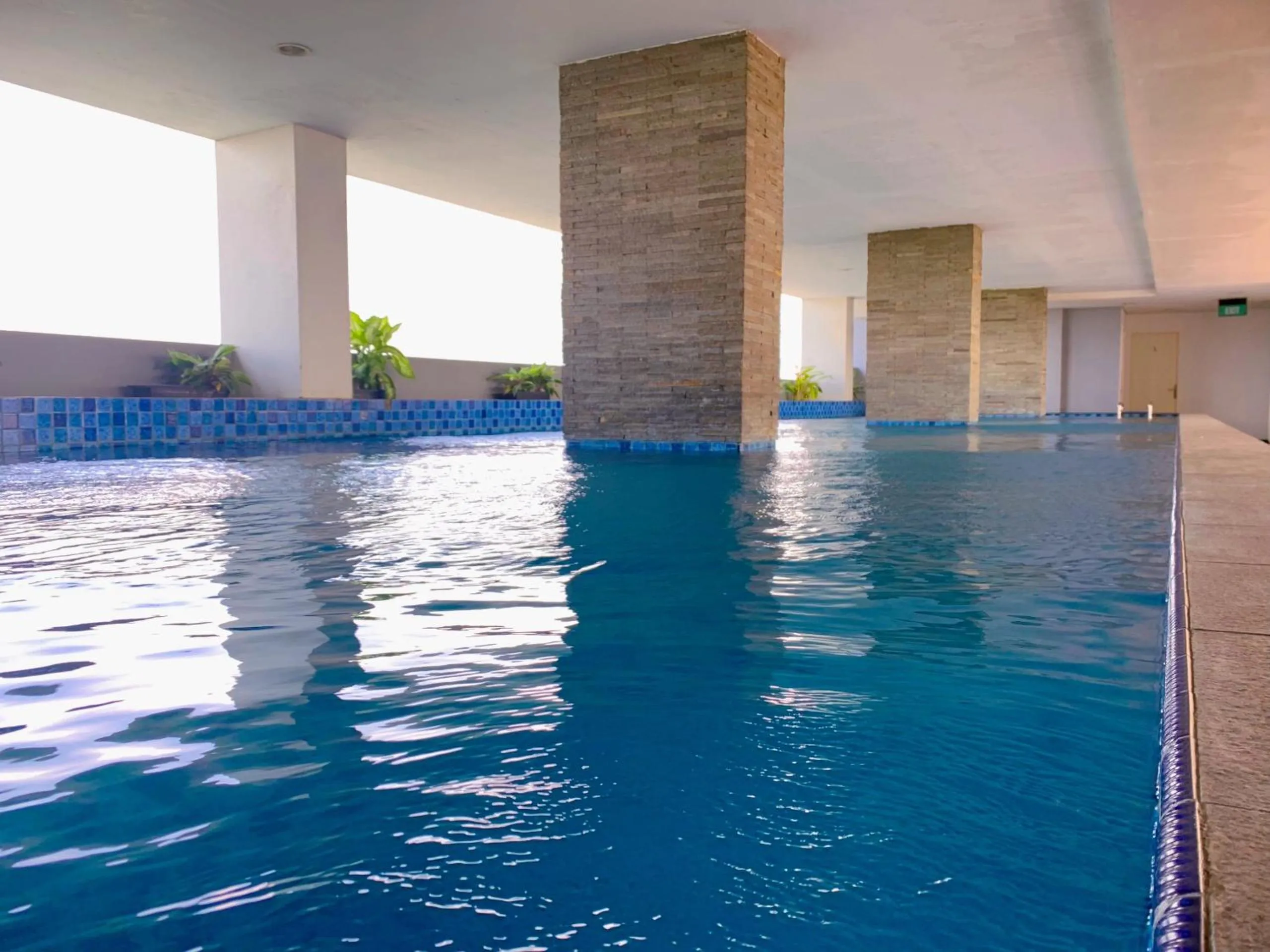 Swimming pool in Apartemen Poris 88 by Benchmark