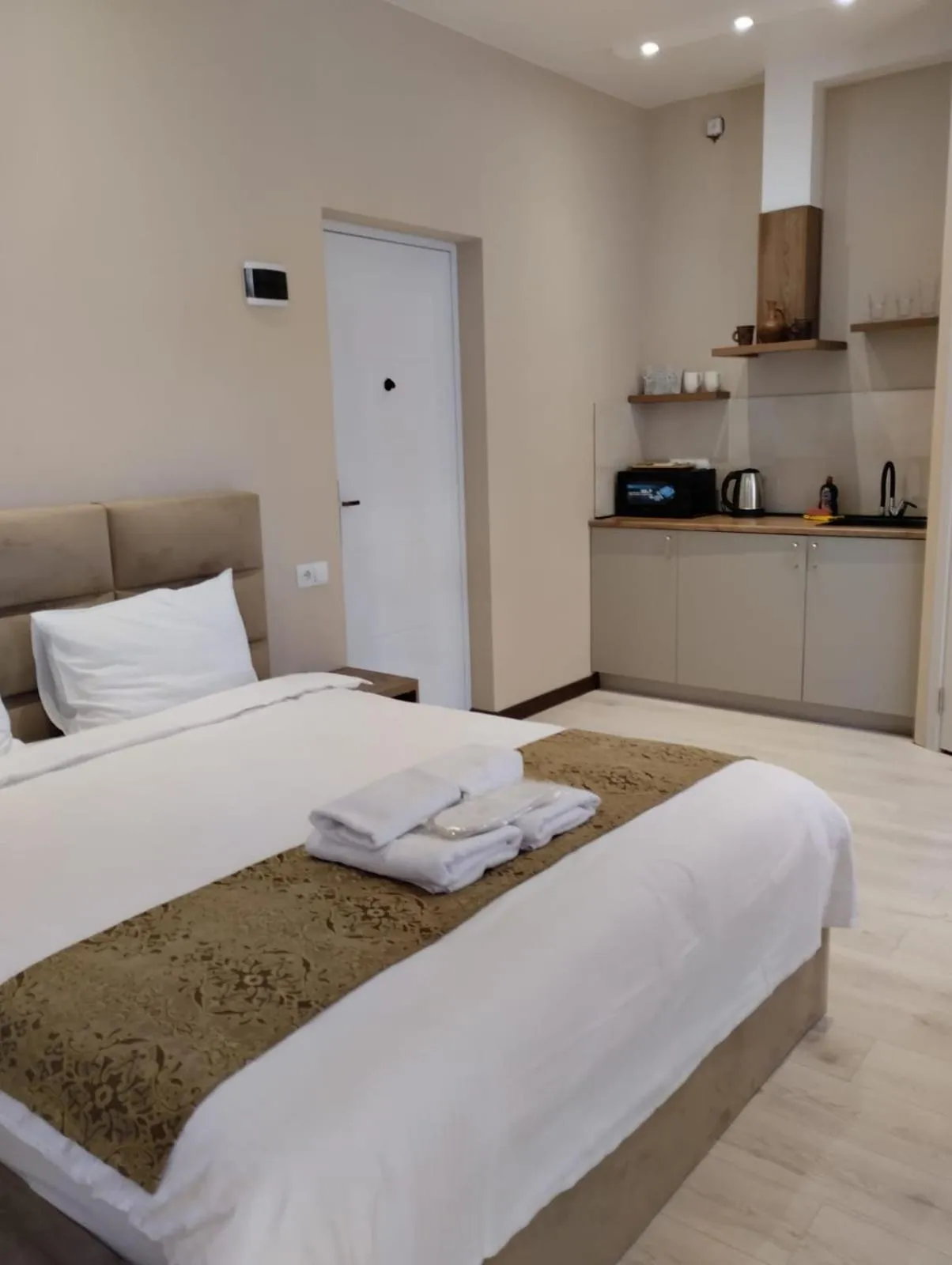 Photo of the whole room, Bed in Sky by the river