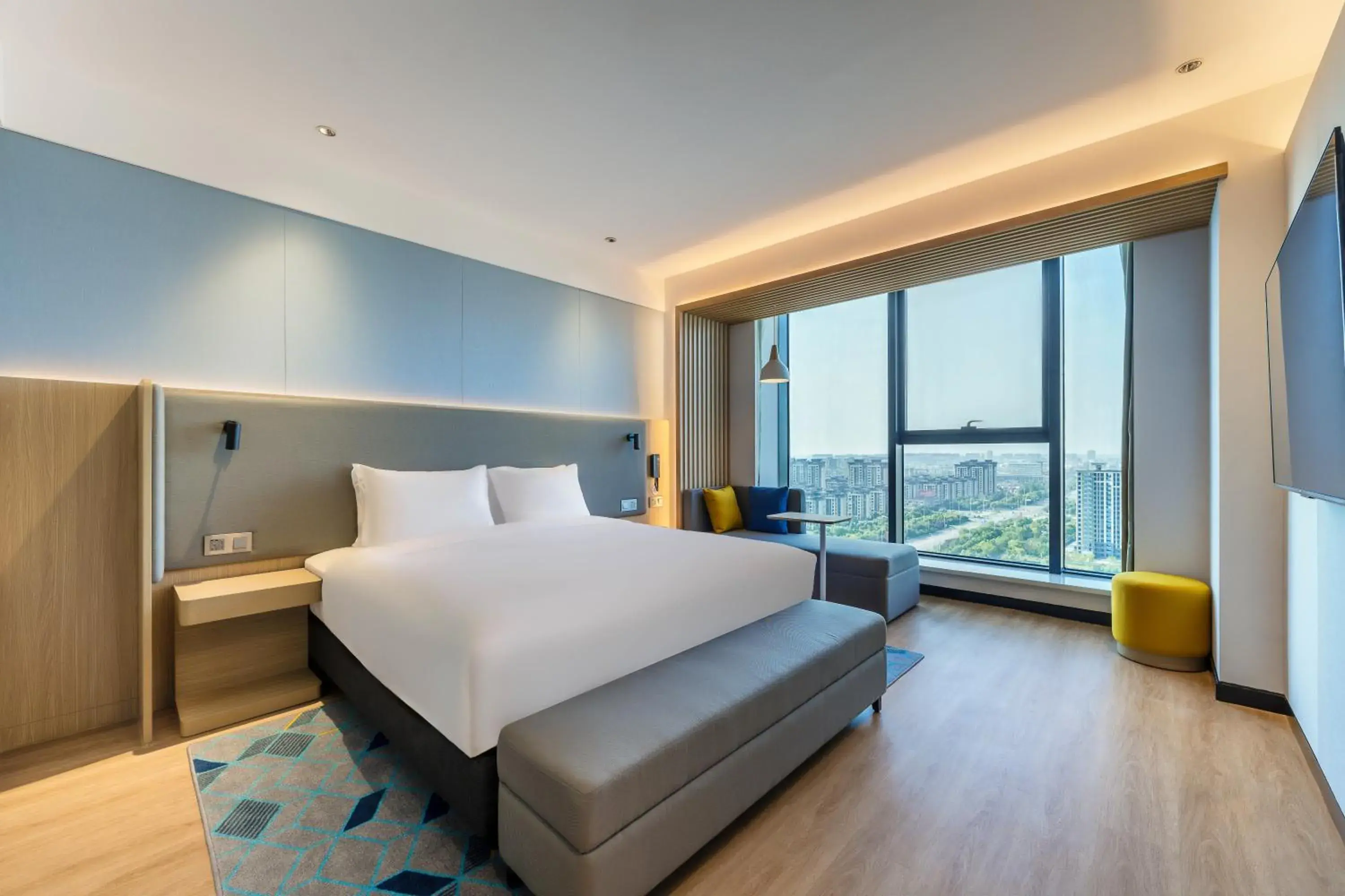 Bed in Holiday Inn Express Zhoukou Dancheng by IHG Bed in Holiday Inn Express Zhoukou Dancheng by IHG