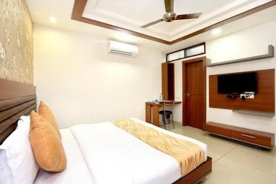 Bed in HOTEL 24x7 INN