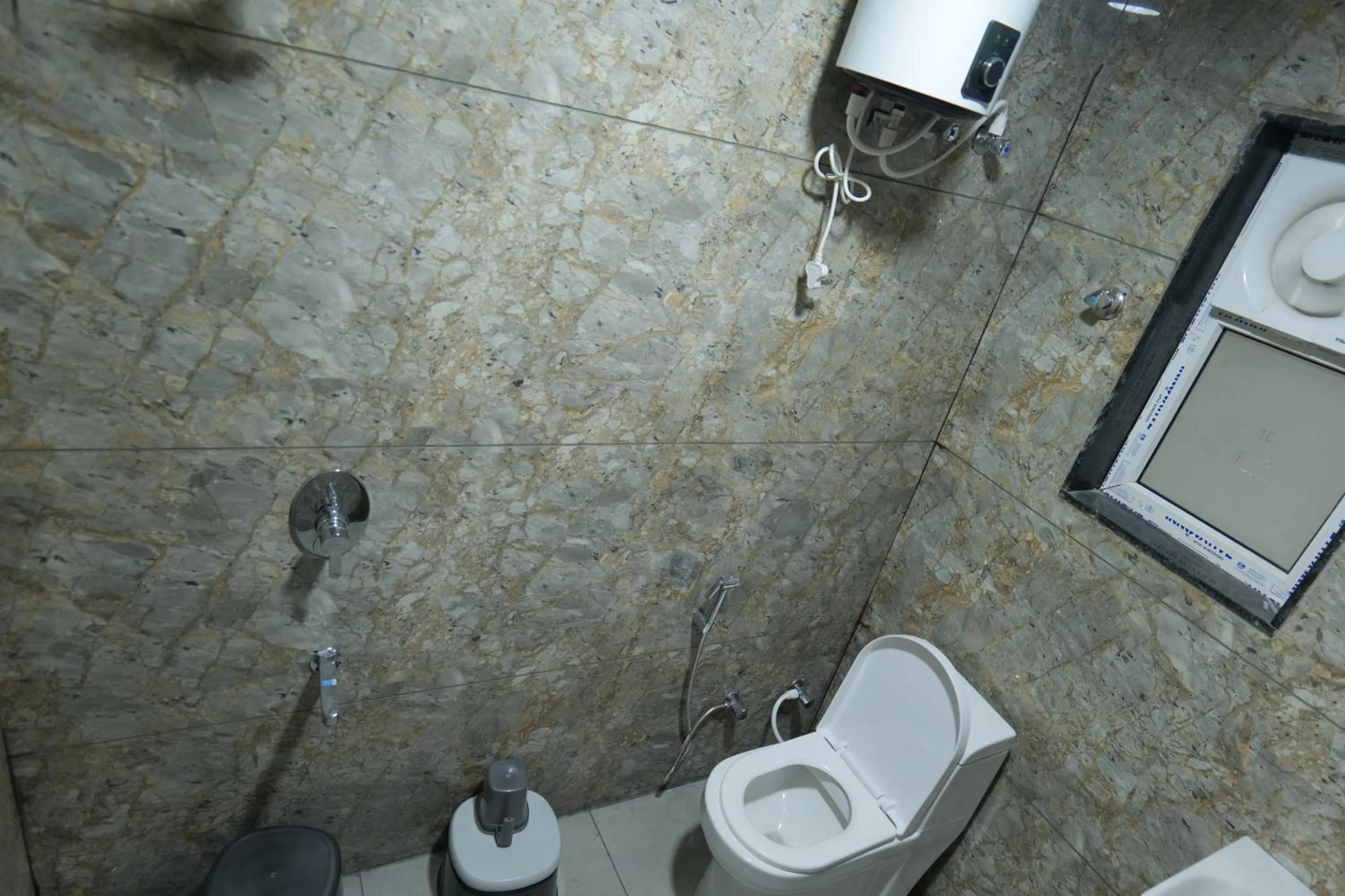 Shower, Bathroom in Hotel Adhiraj Inn