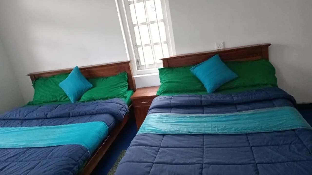 Bed in Frosty Heaven Guest House