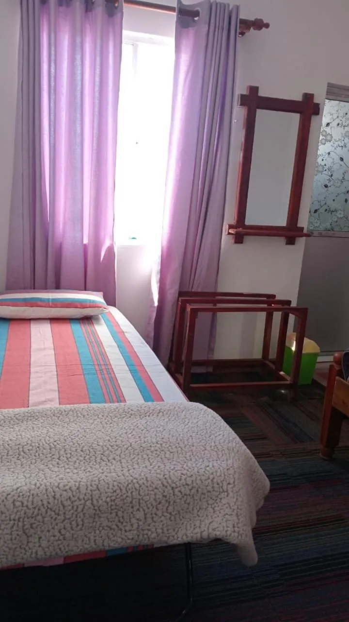 Bed in Frosty Heaven Guest House
