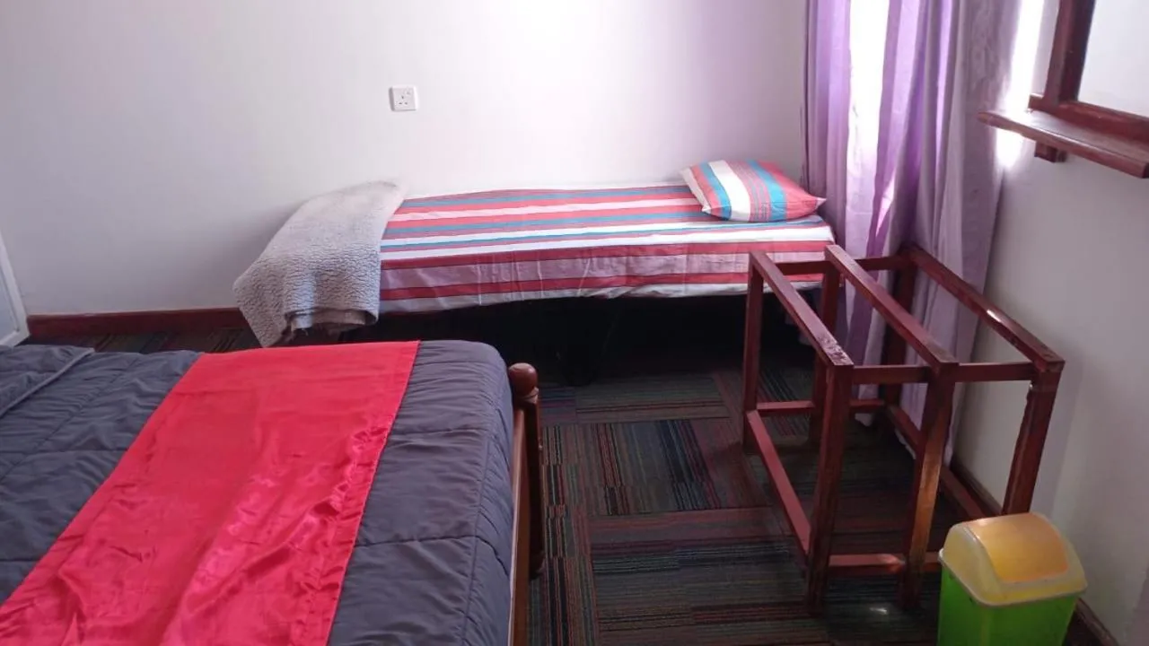 Bed in Frosty Heaven Guest House