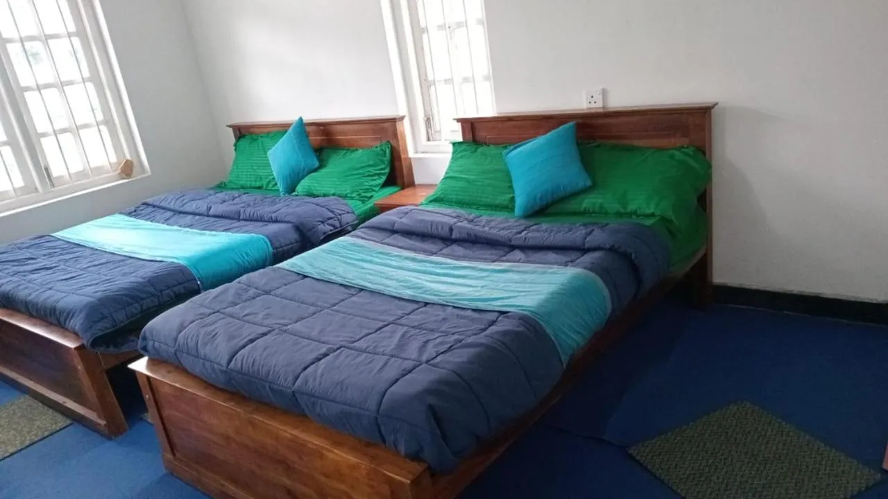 Bed in Frosty Heaven Guest House