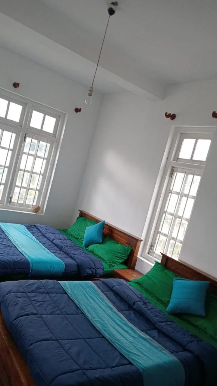 Bed in Frosty Heaven Guest House