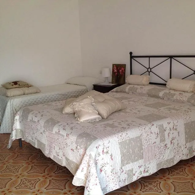 Bed in Azzurramare Bed & Breakfast