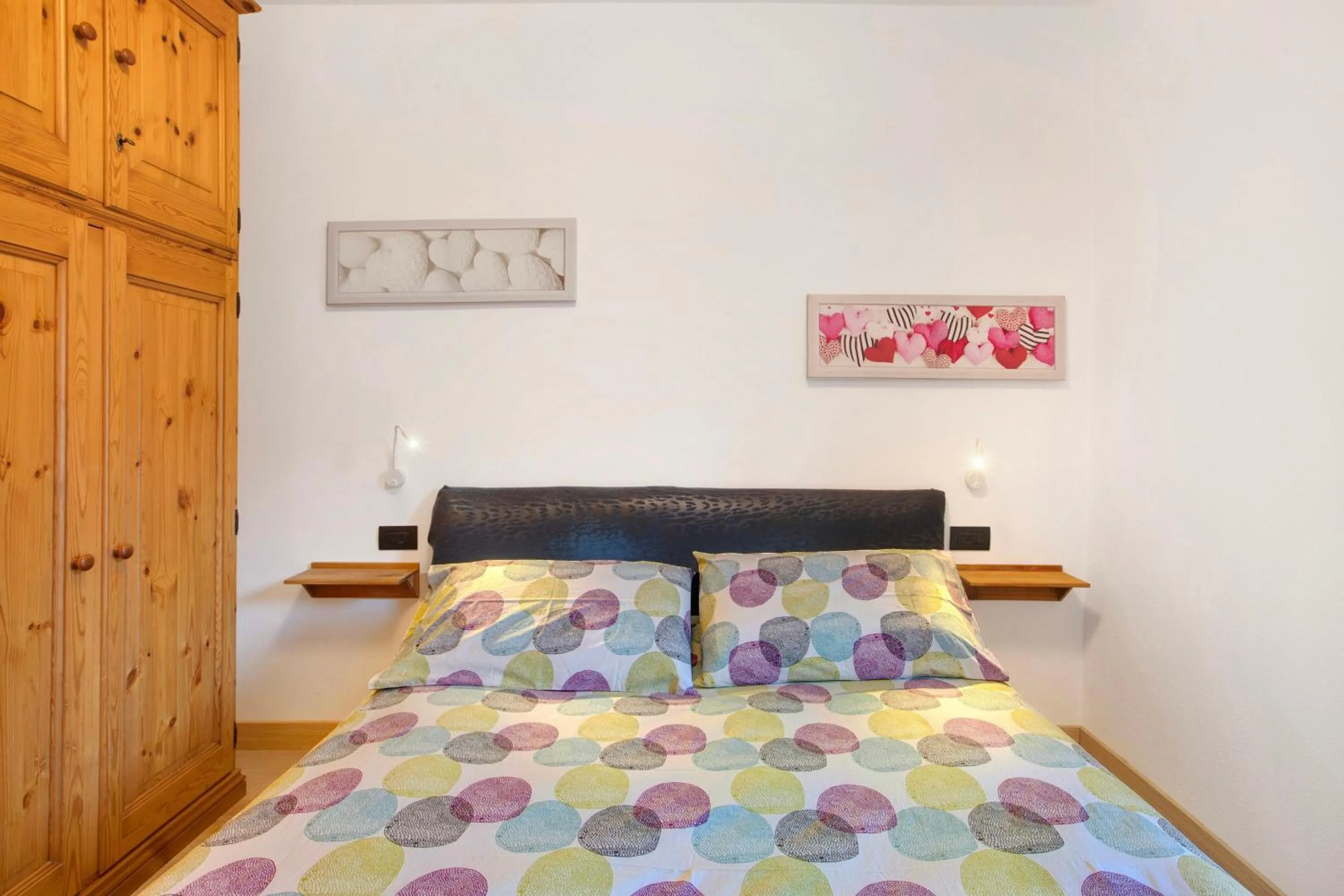 Living room, Bed in Appartamento Arlecchino Livigno